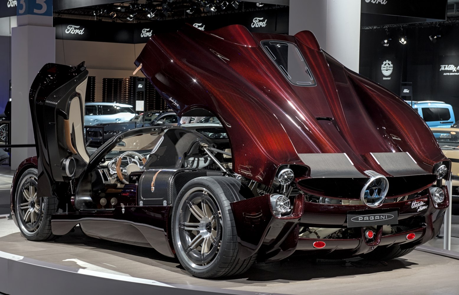 Carbon fiber body with open rear wing and butterfly door