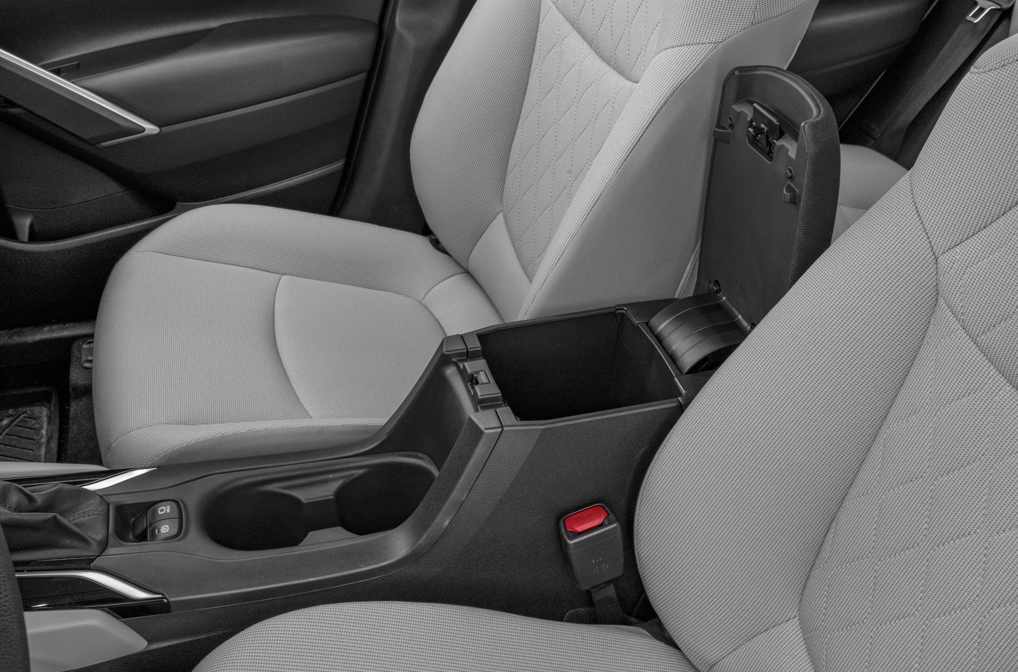 Center console storage compartment and front seats upholstery