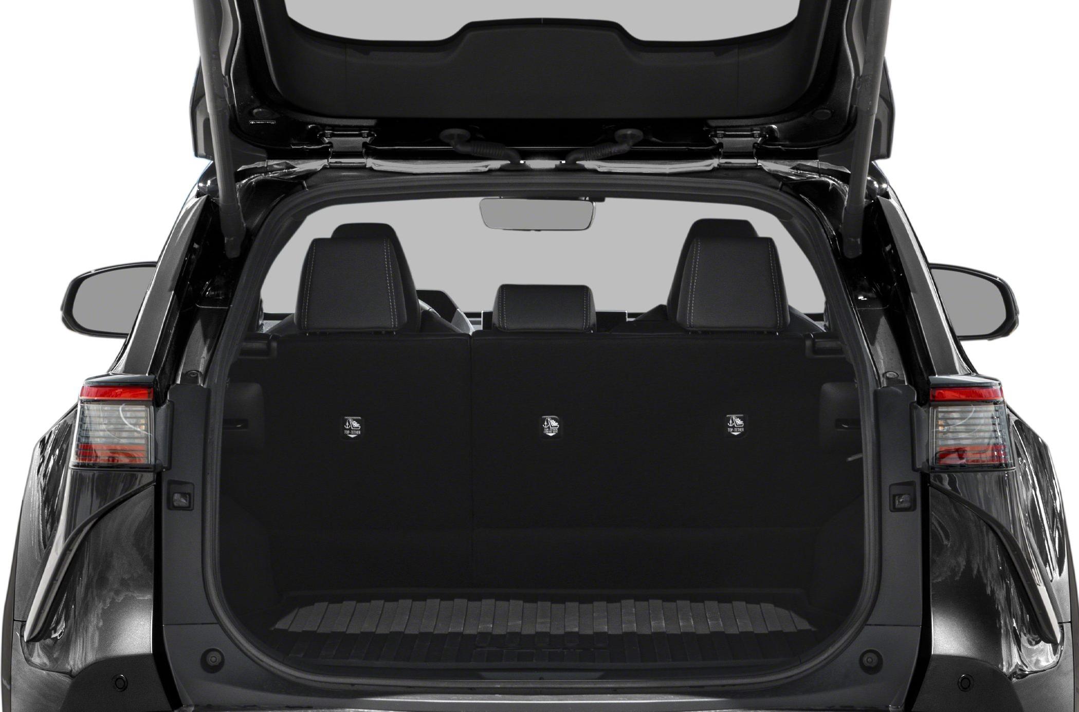 Open tailgate with spacious rear cargo area and visible rear seats