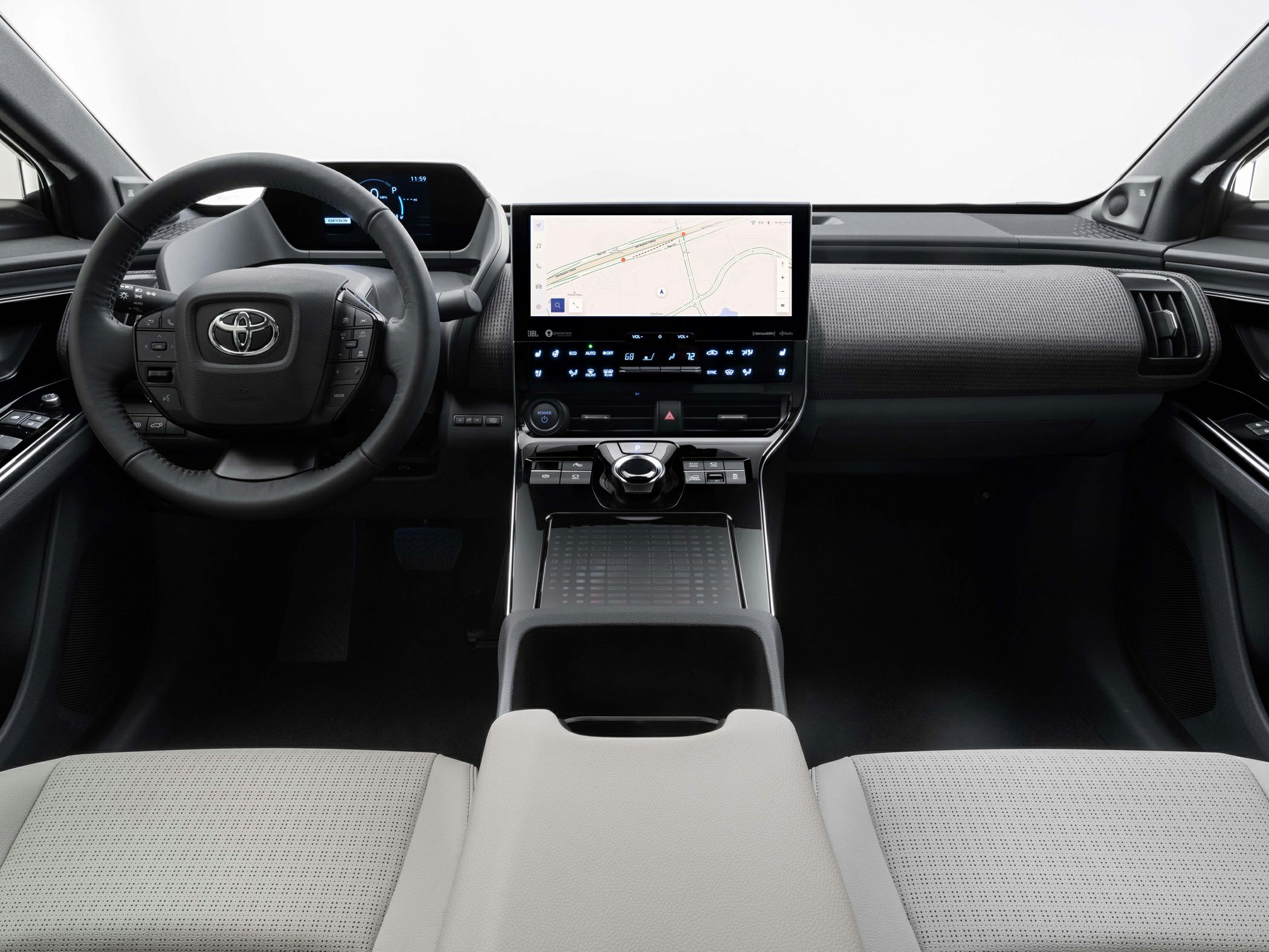 Interior dashboard with digital driver display and large central touchscreen