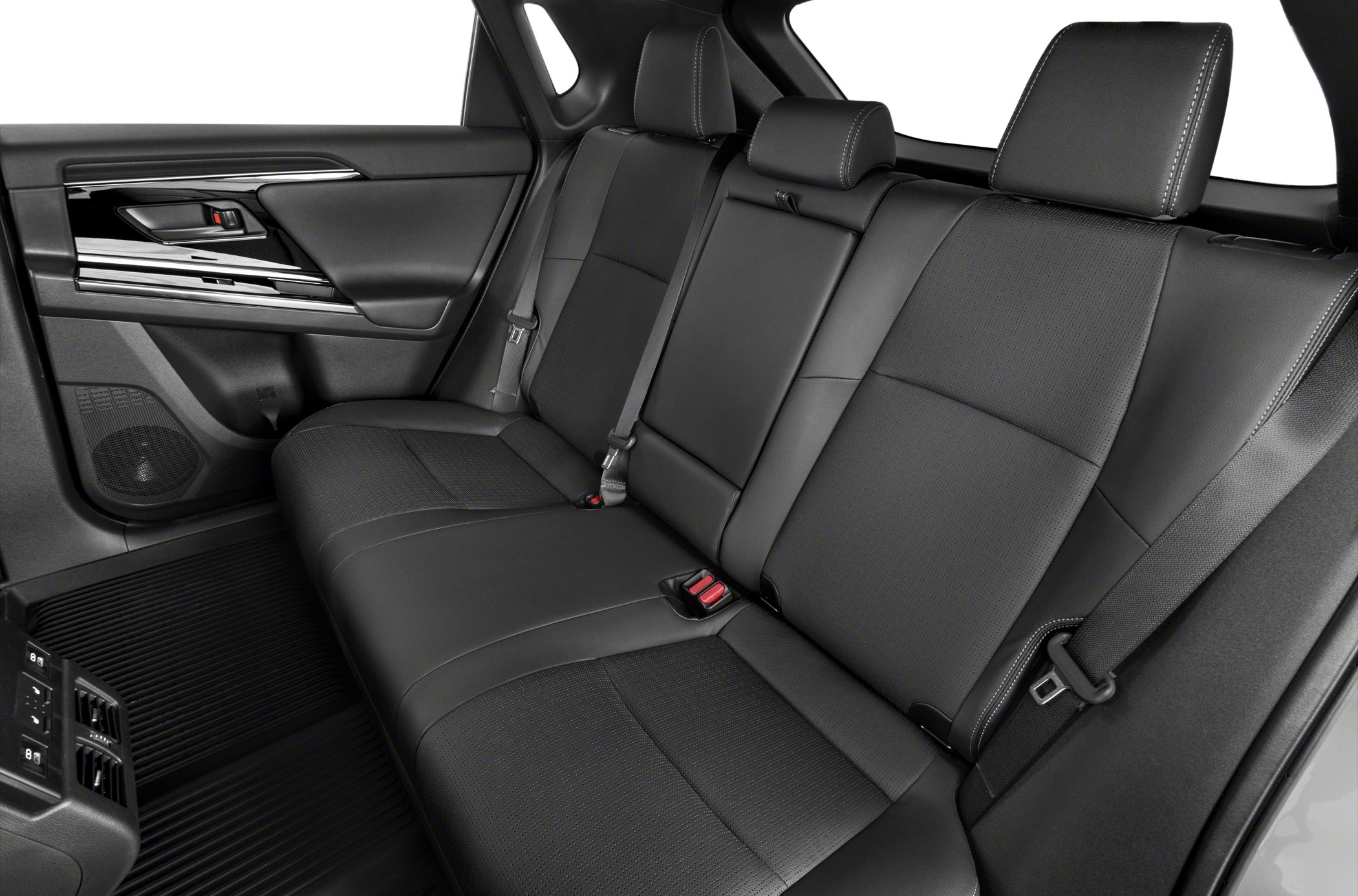 Rear seating with modern black leather upholstery and integrated headrests