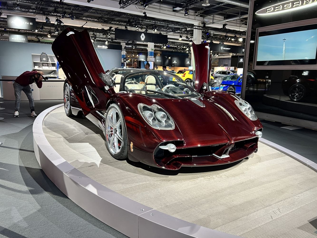 Luxury sports car with gullwing doors and aerodynamic design