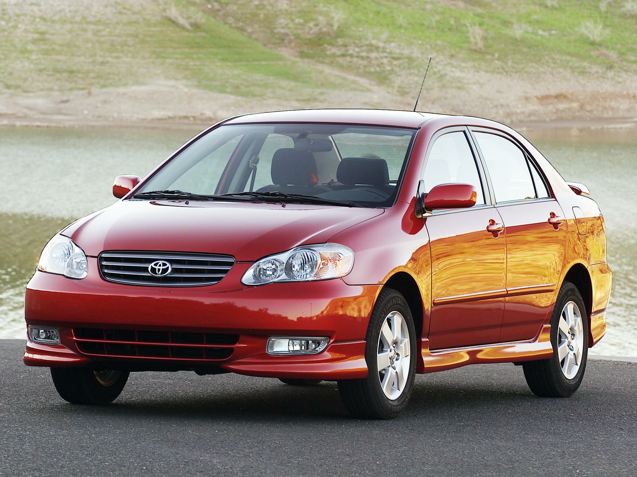 Sporty compact sedan with body kit, alloy wheels, and fog lights