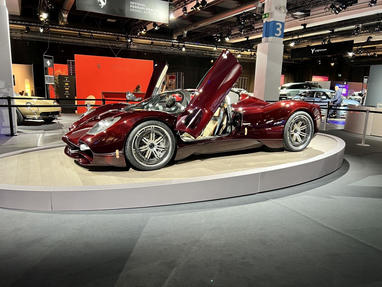 Scissor doors and carbon fiber body on a luxury roadster
