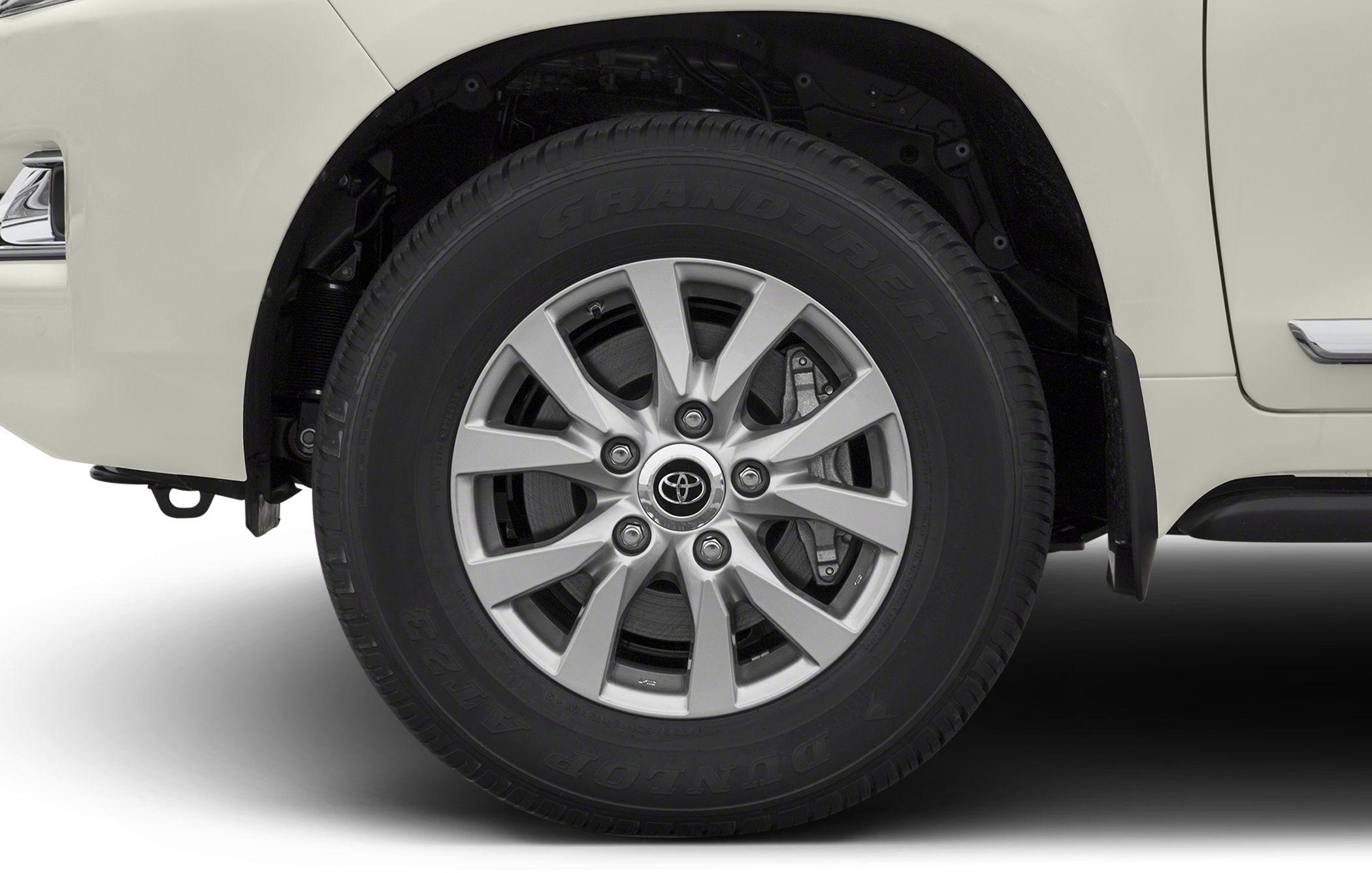 Close-up of alloy wheel and Dunlop Grandtrek tire