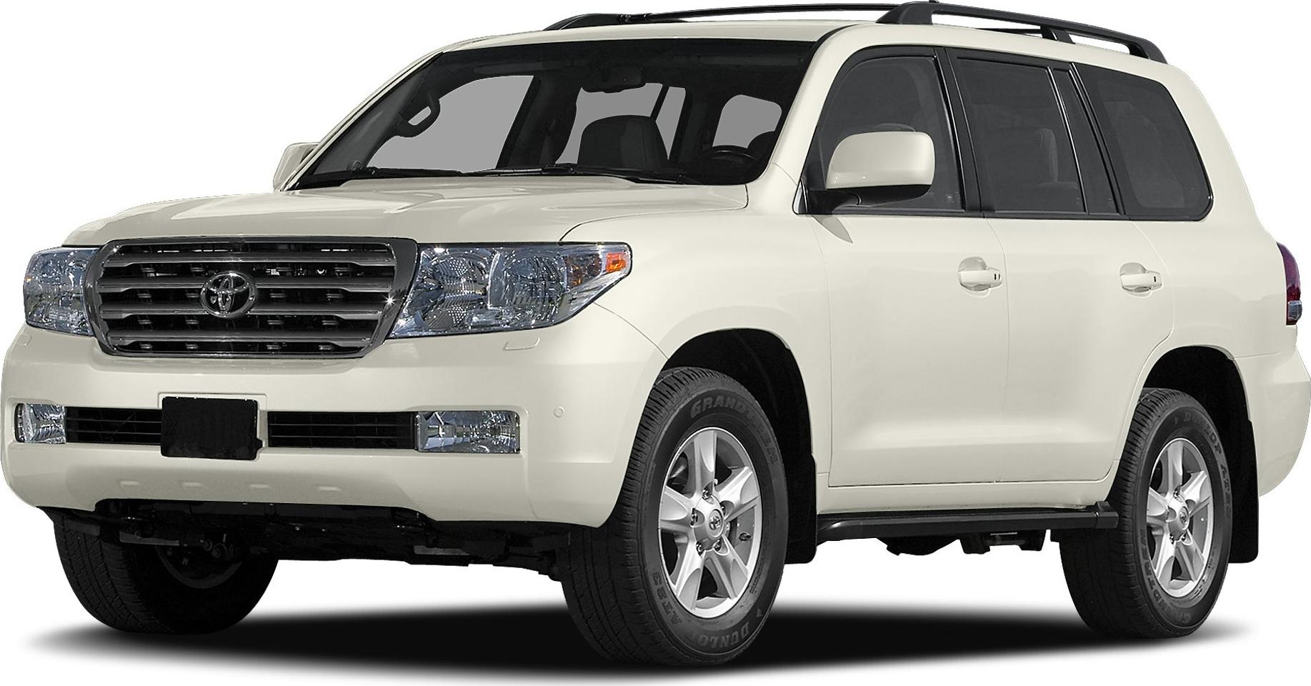 Front-side view of a mid-2000s SUV with prominent grille and roof rails