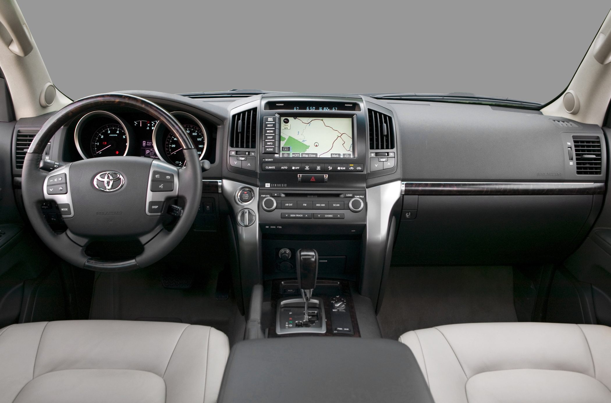 Dashboard and center console with navigation display and steering wheel controls
