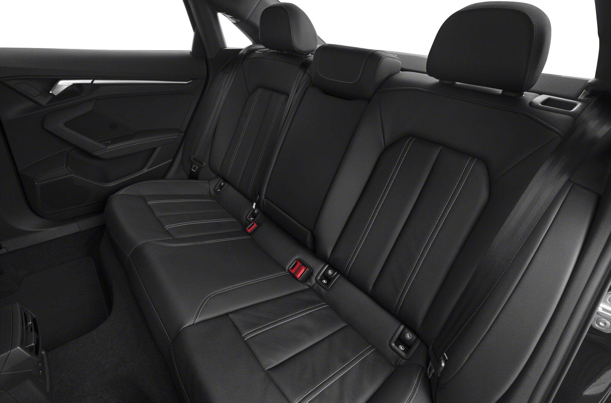 Black leather rear passenger seats with stitching and headrests
