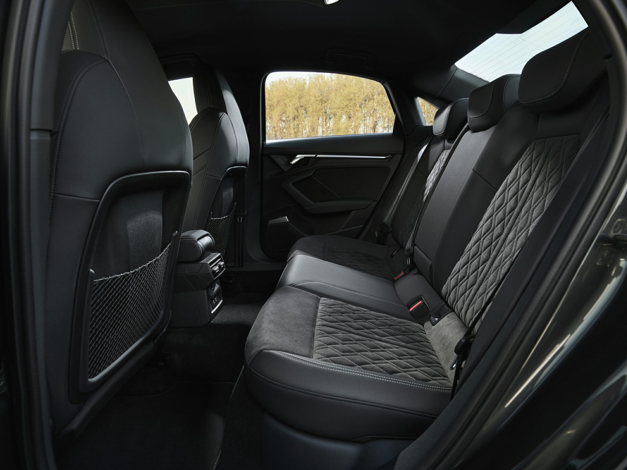 Rear seat interior with quilted upholstery and spacious legroom