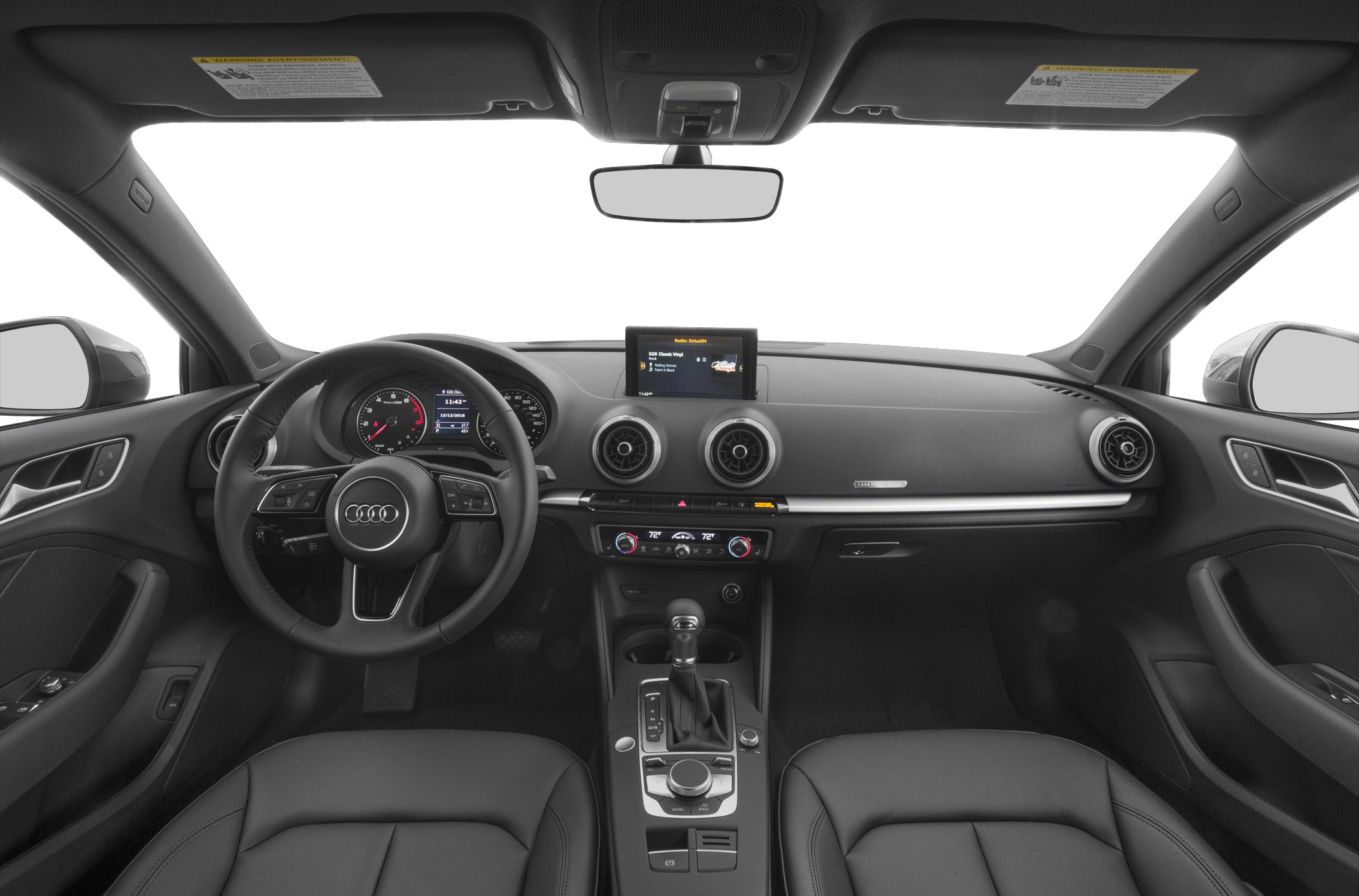 Dashboard, steering wheel, and center console view of a car interior
