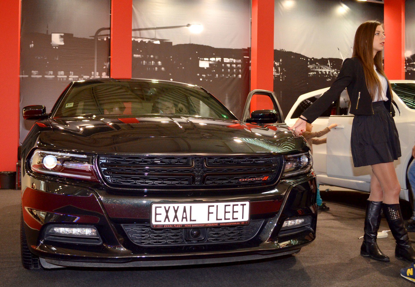 Front view of car with black grille and LED headlights