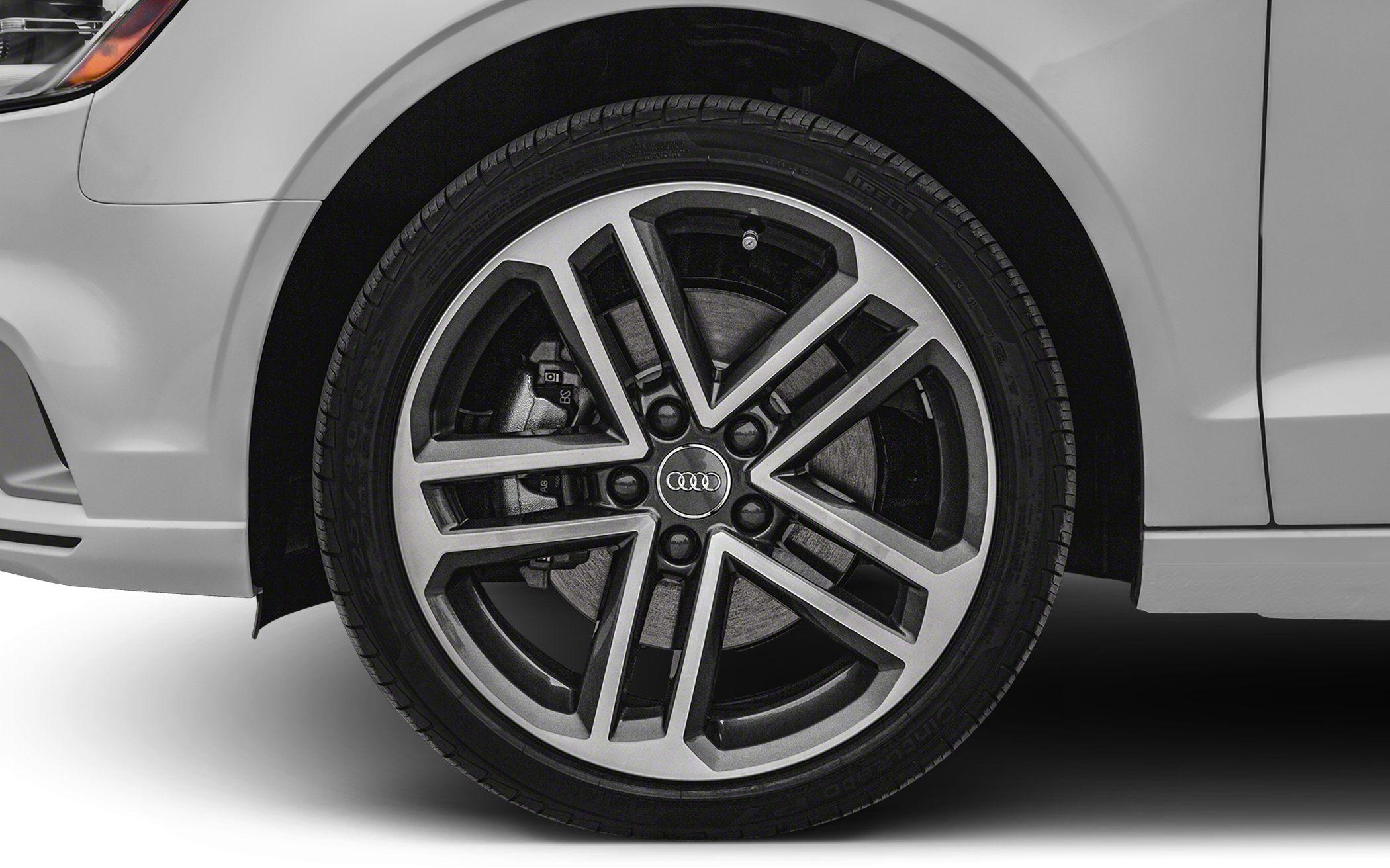 Close-up of alloy wheel with detailed spoke design and tire tread
