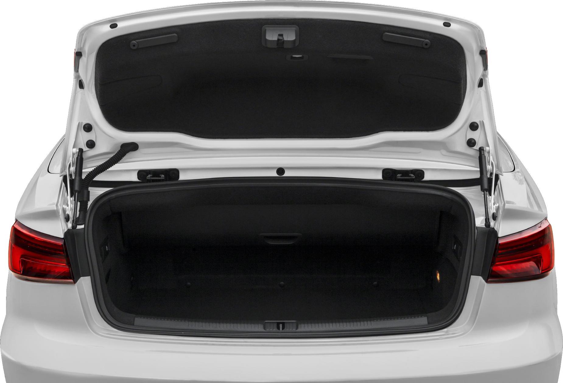 Open rear trunk storage space with illuminated compartment