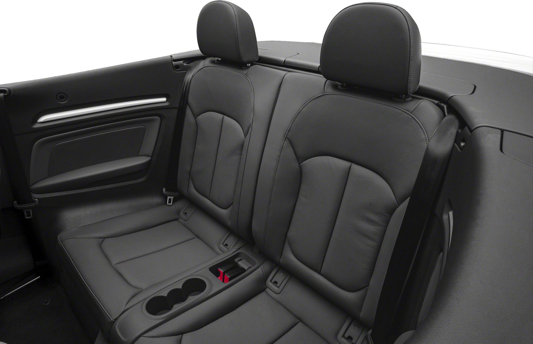 Rear leather seats with headrests and integrated cupholders