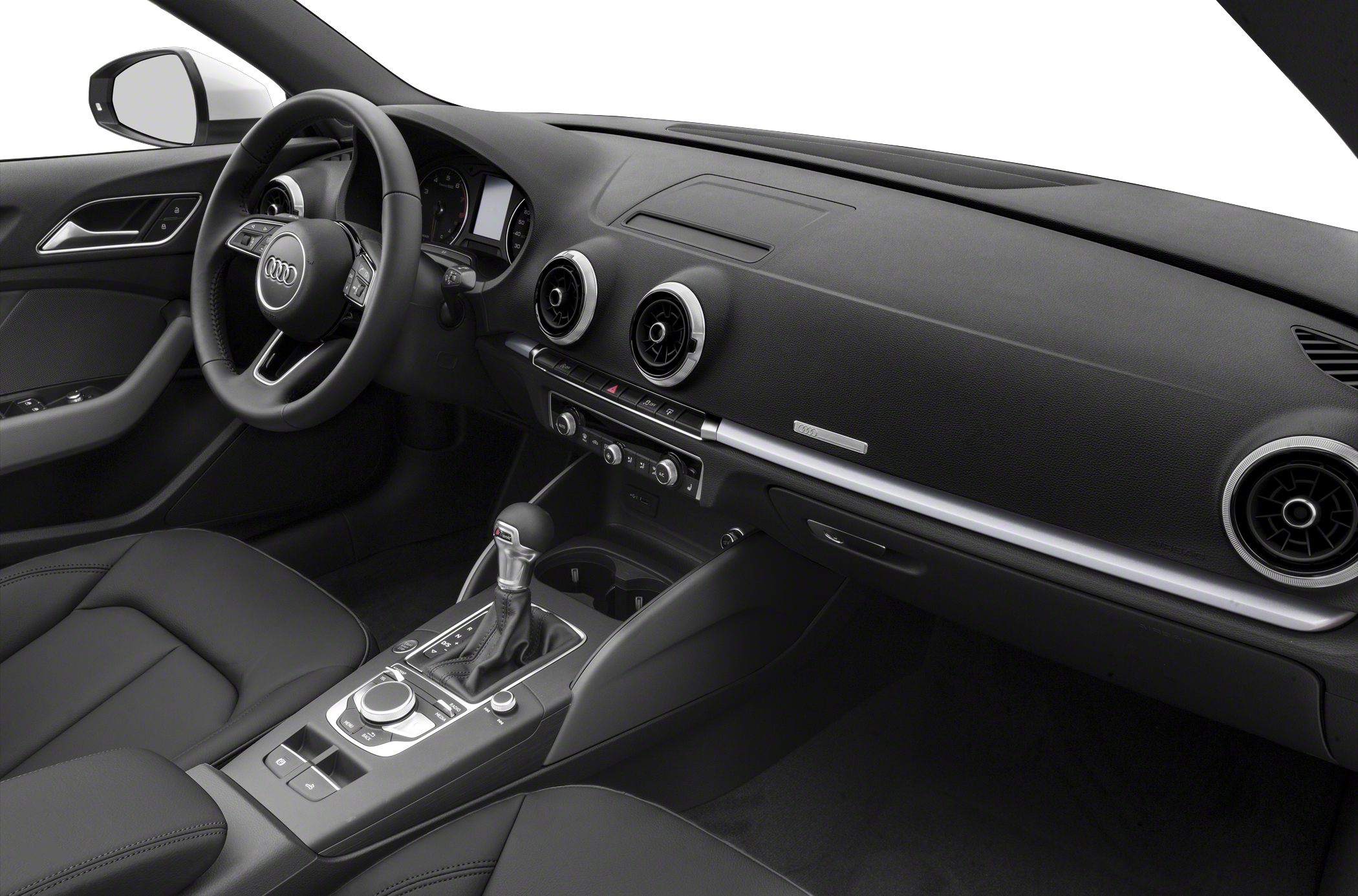 Audi interior with steering wheel, dashboard, and center console.