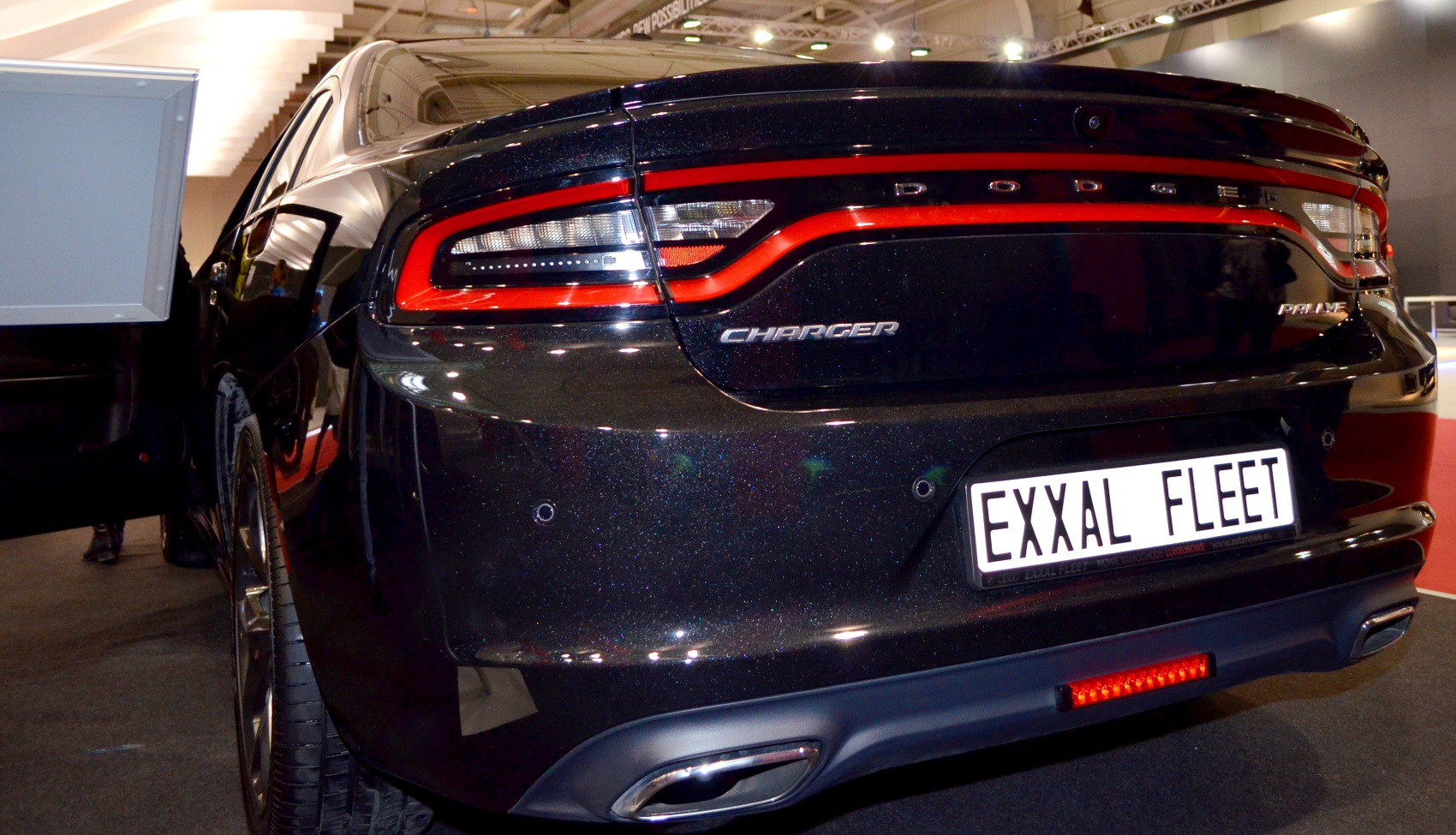 Rear design with signature tail light and dual exhaust.