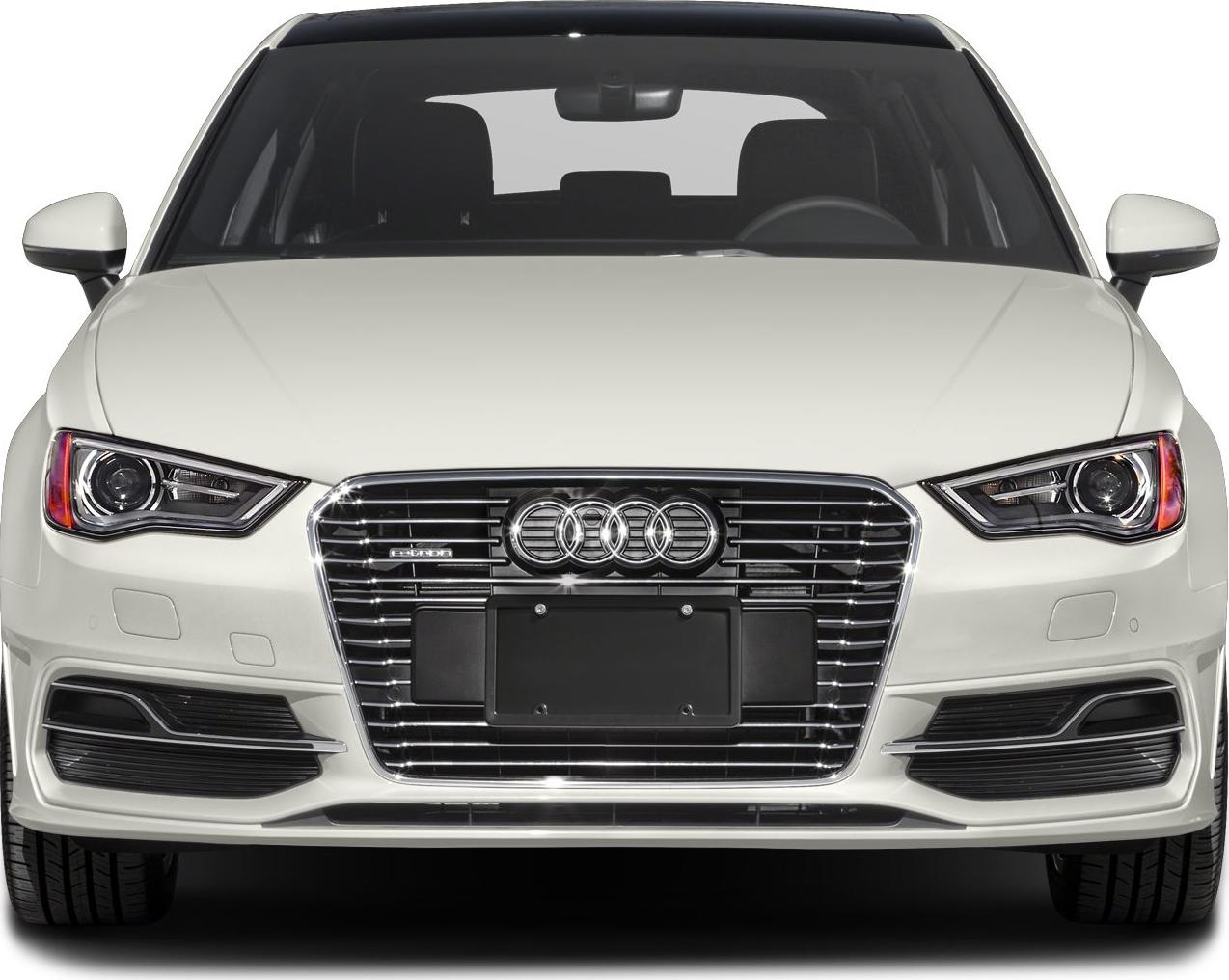 Close-up of chrome grille and LED headlights