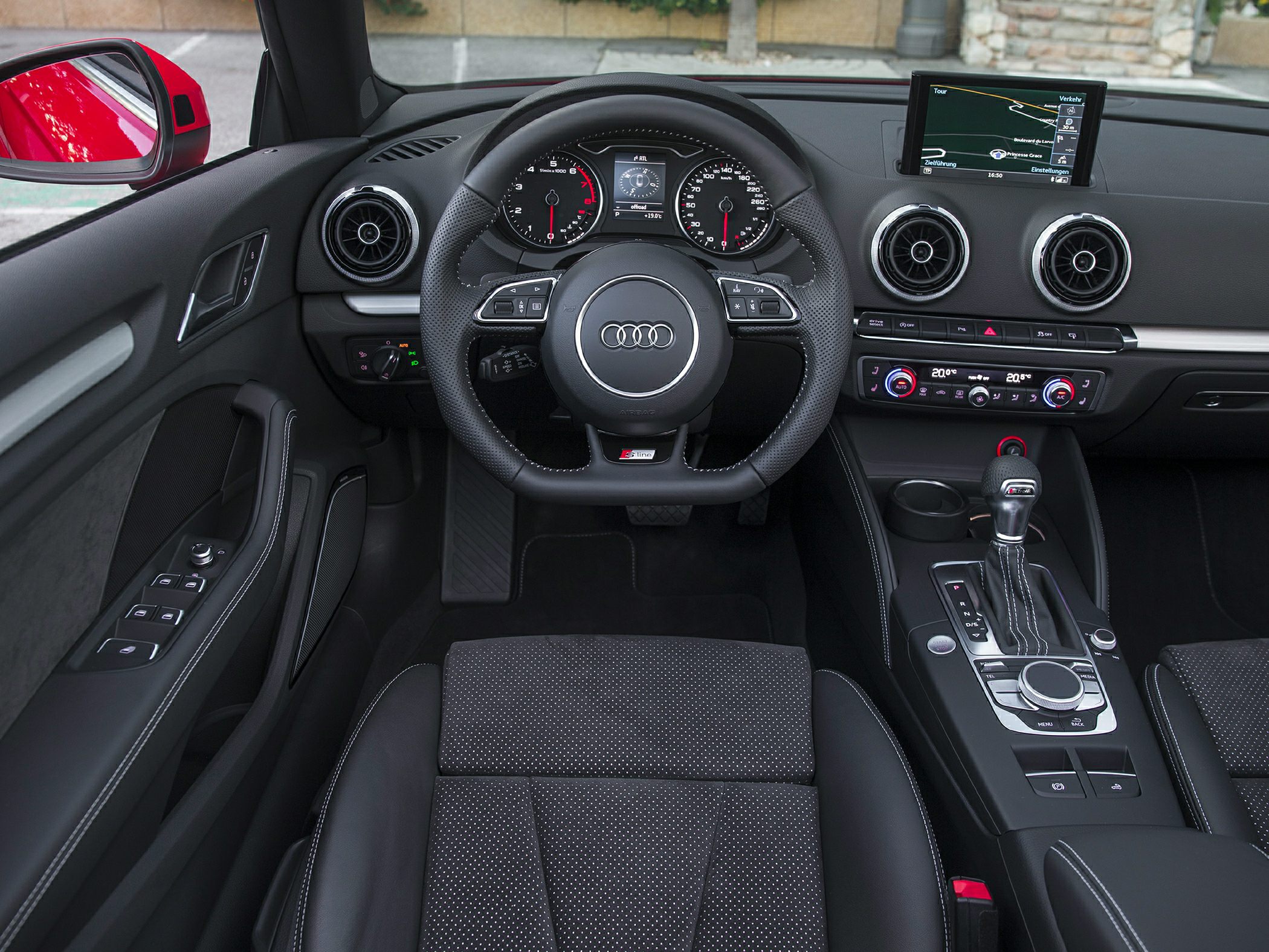 Multifunction steering wheel and modern dashboard with infotainment screen