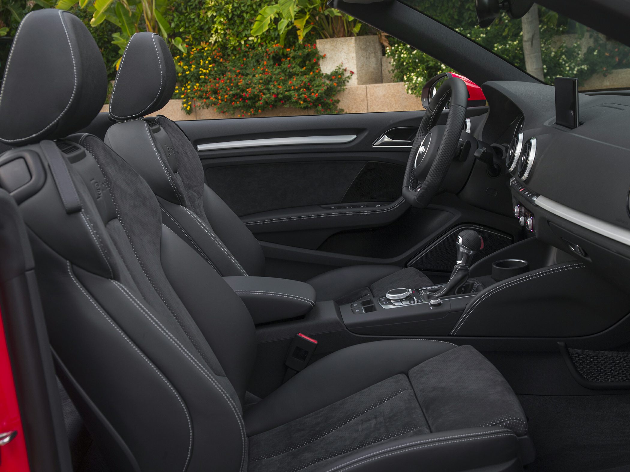Sporty front seats and dashboard interior of a convertible