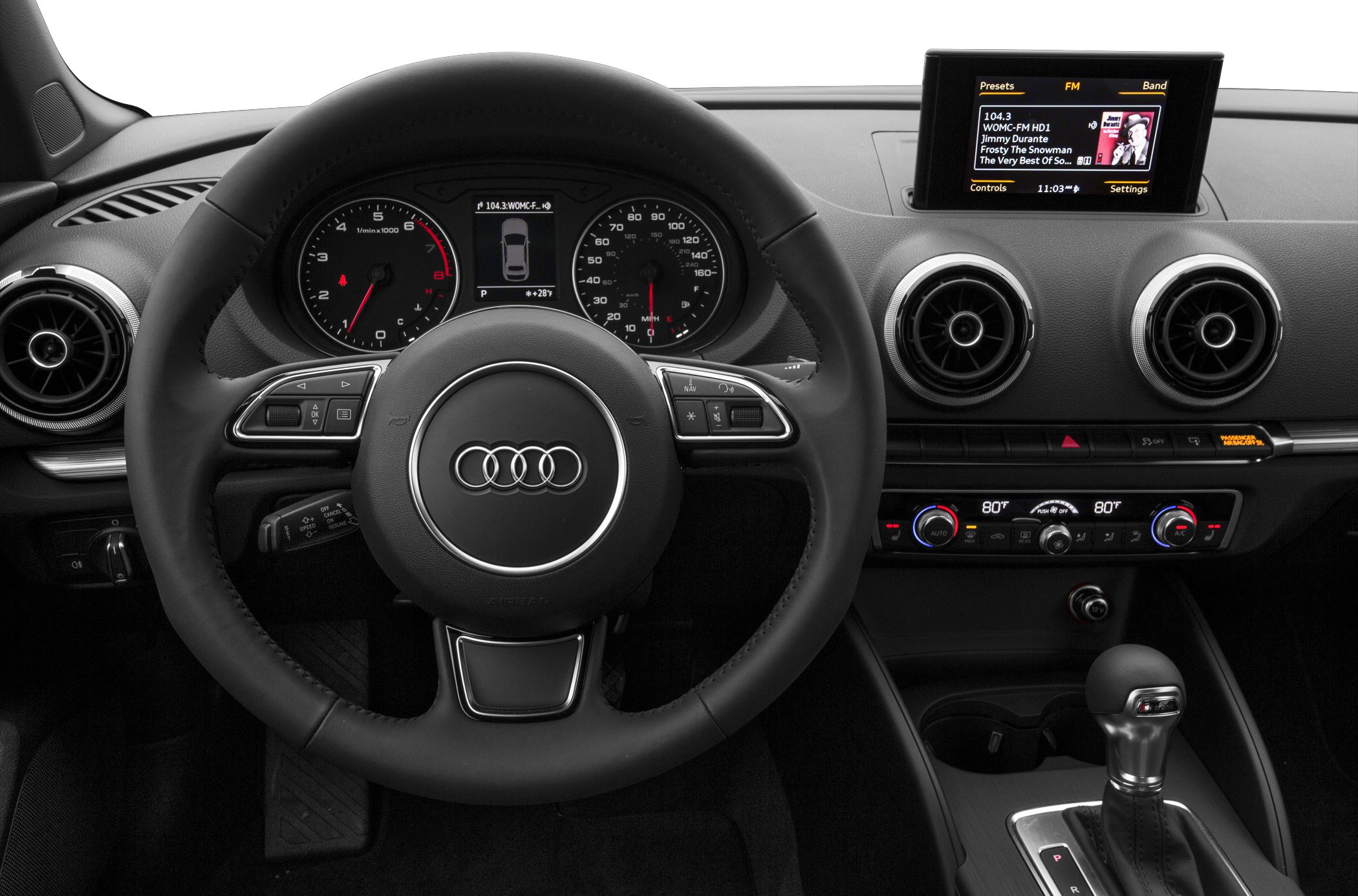 Steering wheel, instrument cluster, infotainment screen, and climate controls of car interior.