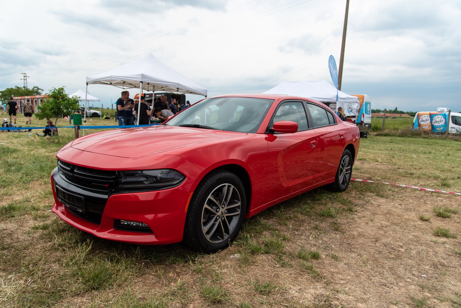 Front three-quarter view of red sports sedan