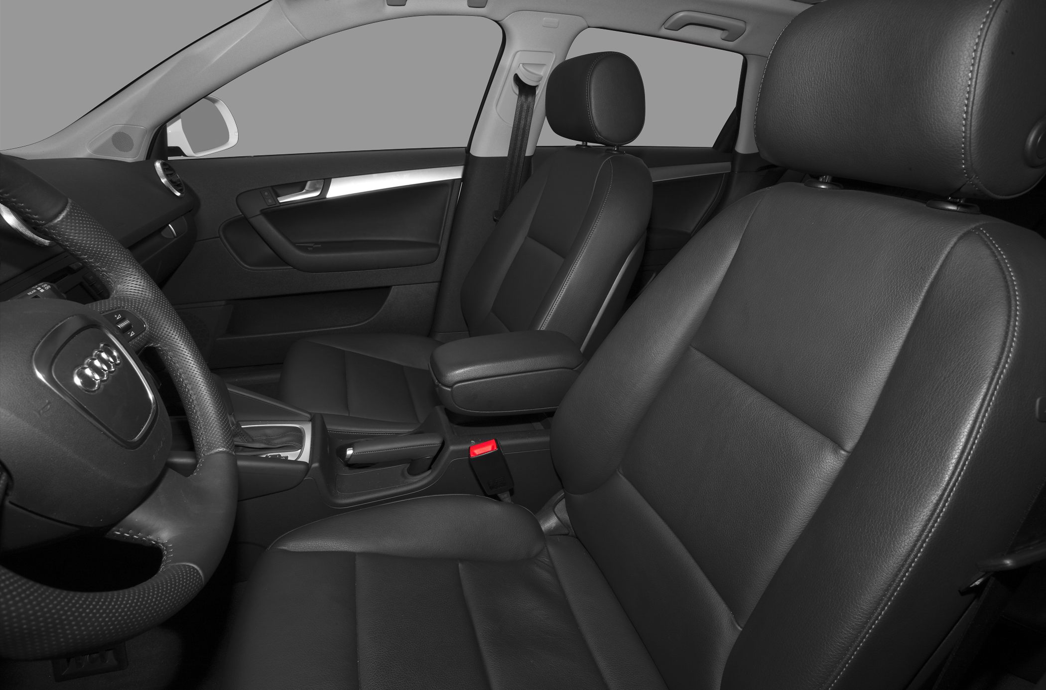 Black leather seats and steering wheel with central armrest