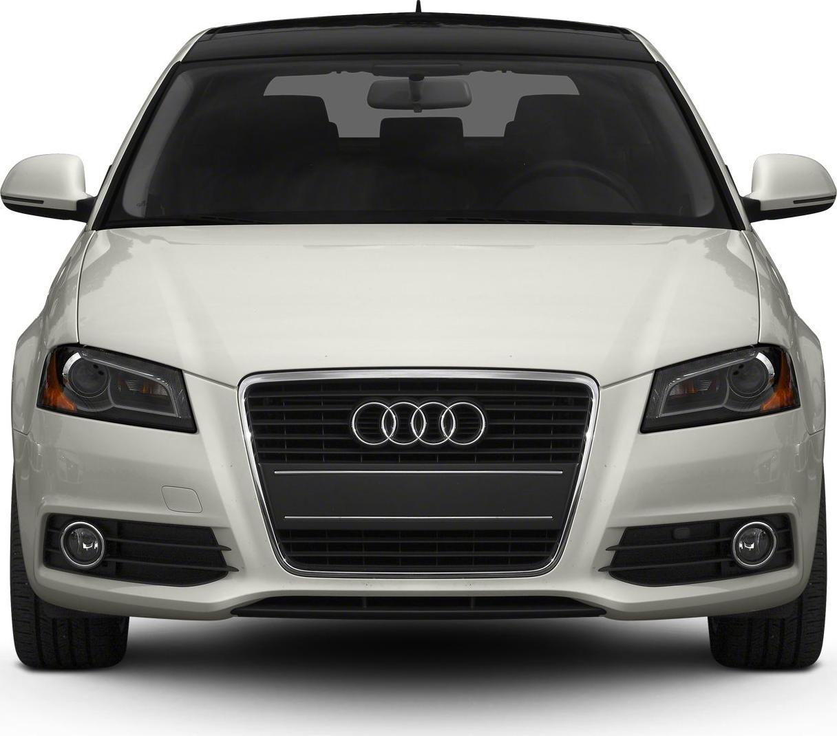 Front view with headlights, grille, and fog lights