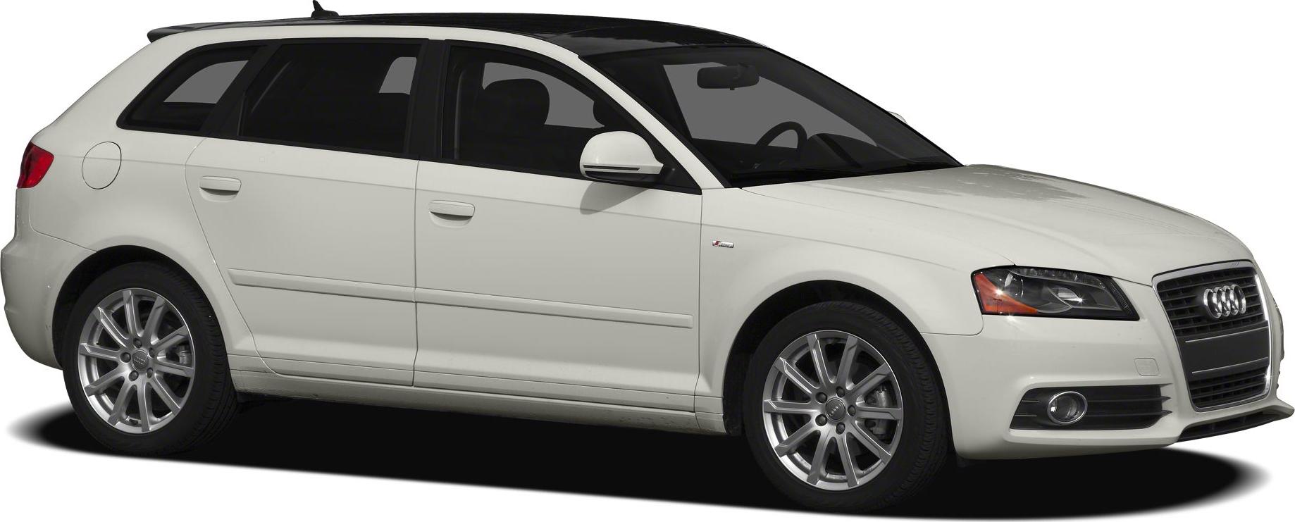 White hatchback with alloy wheels and tinted windows front side view