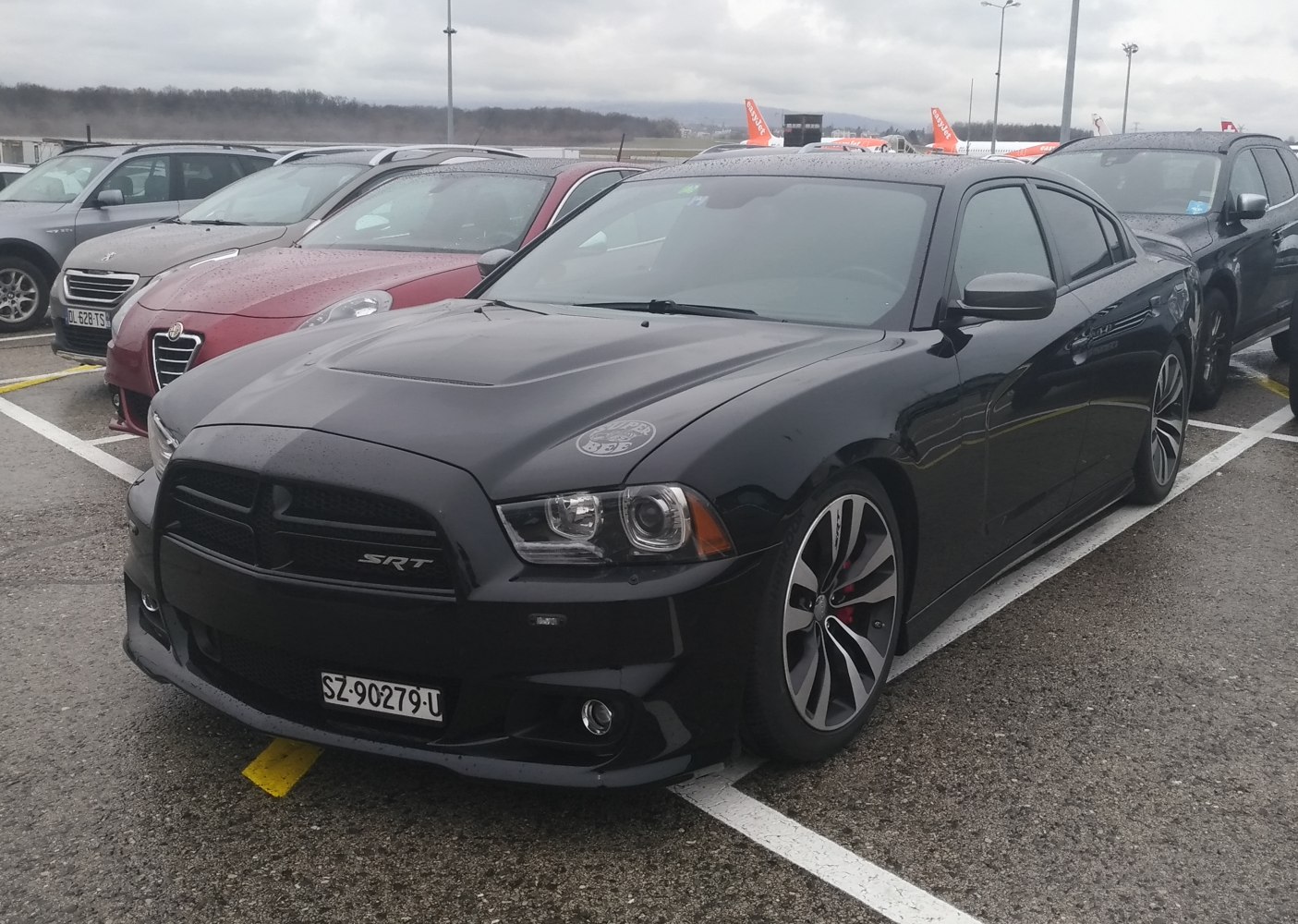Aggressive front grille and sharp headlights with stylish alloy wheels