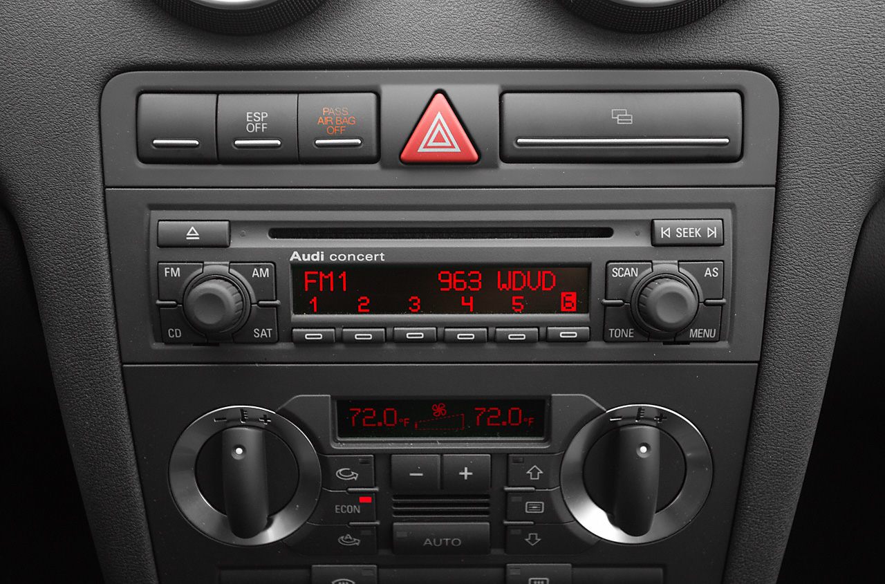 Car stereo and dual-zone climate controls with digital temperature display