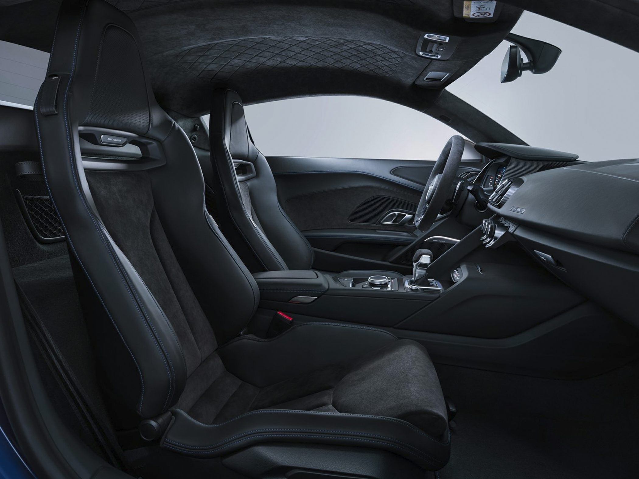 Premium racing bucket seats and Alcantara-trimmed interior cabin