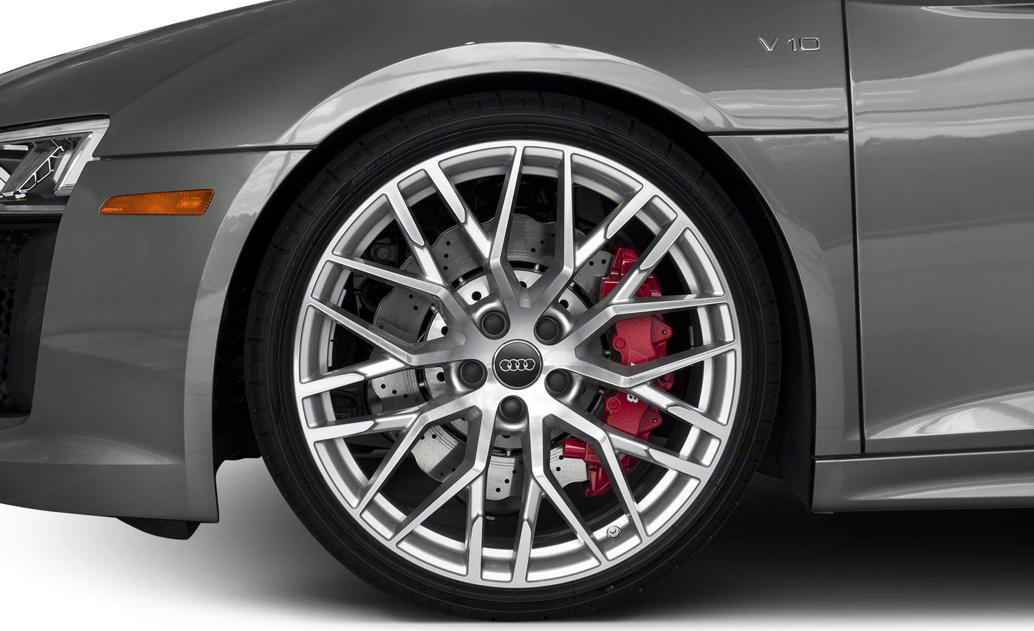 Close-up of alloy wheel with red brake calipers and V10 badge