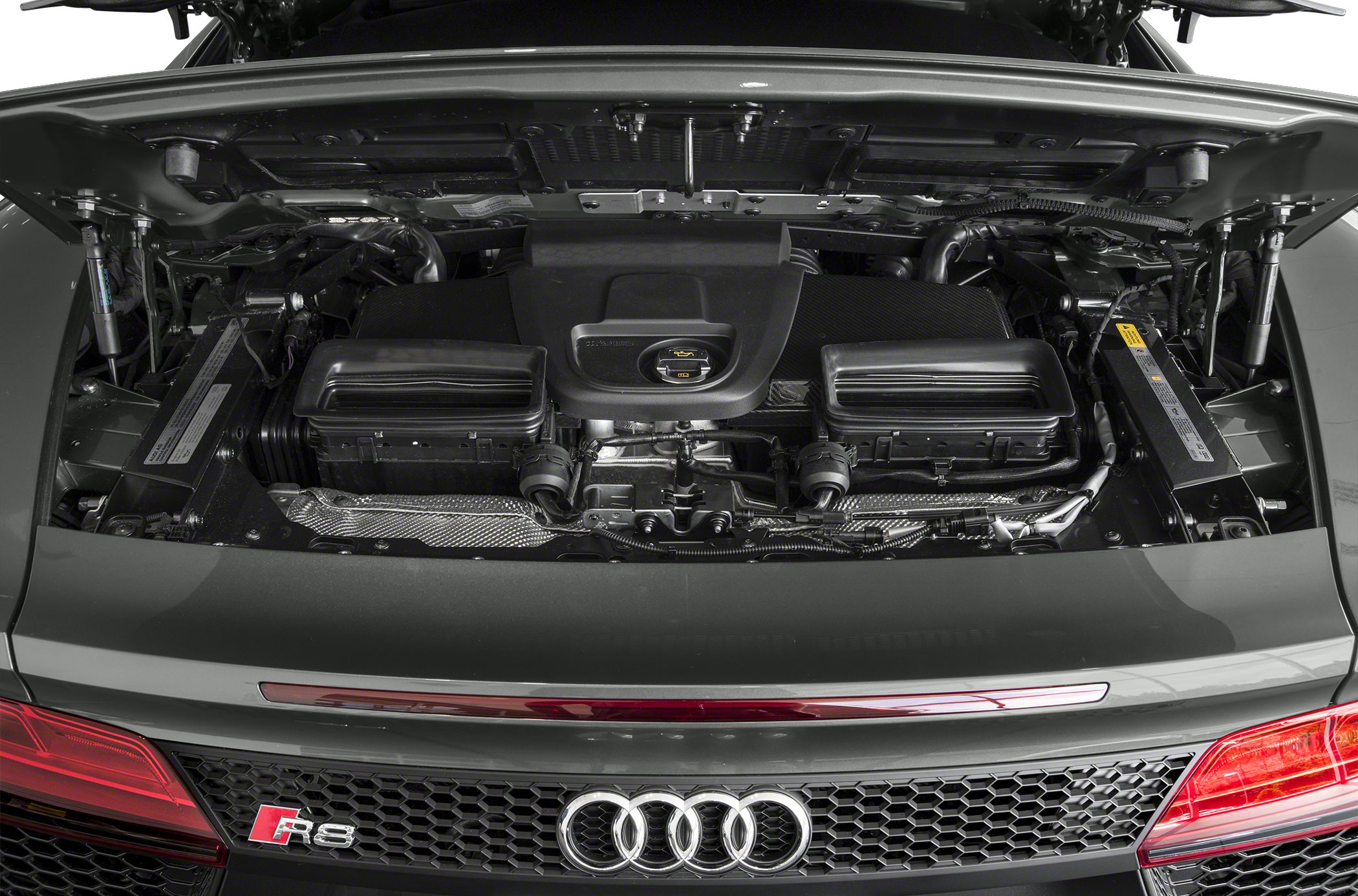 Mid-engine layout with rear ventilation system and air intakes