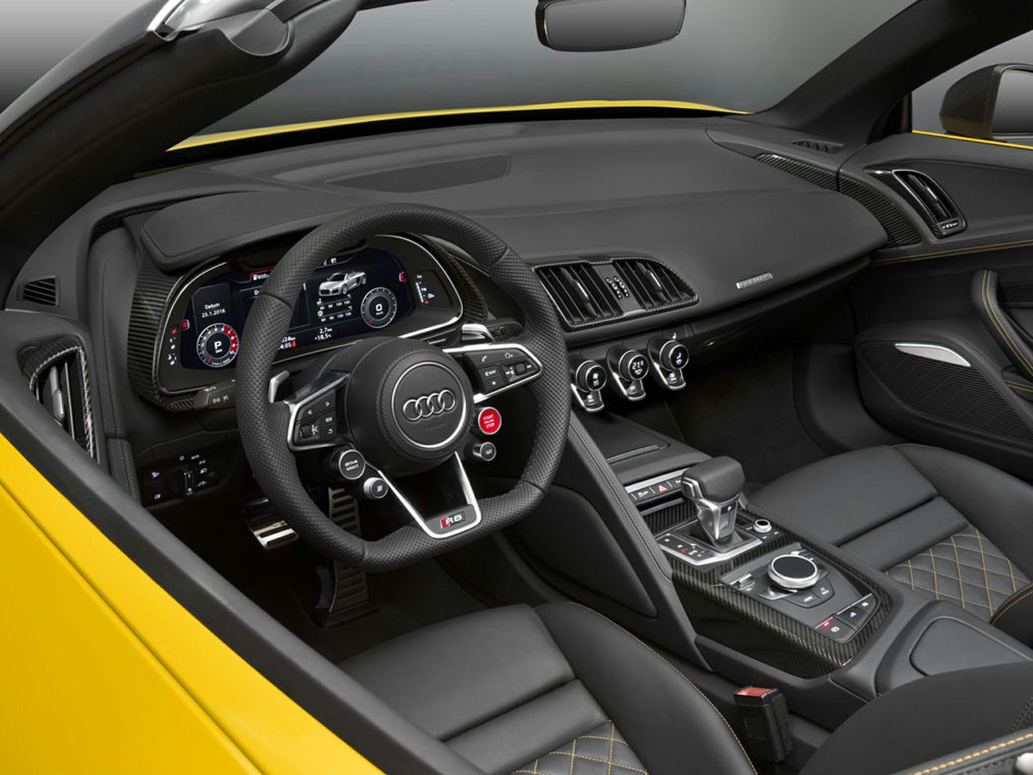 Luxury sports convertible interior with digital virtual cockpit and carbon fiber trim