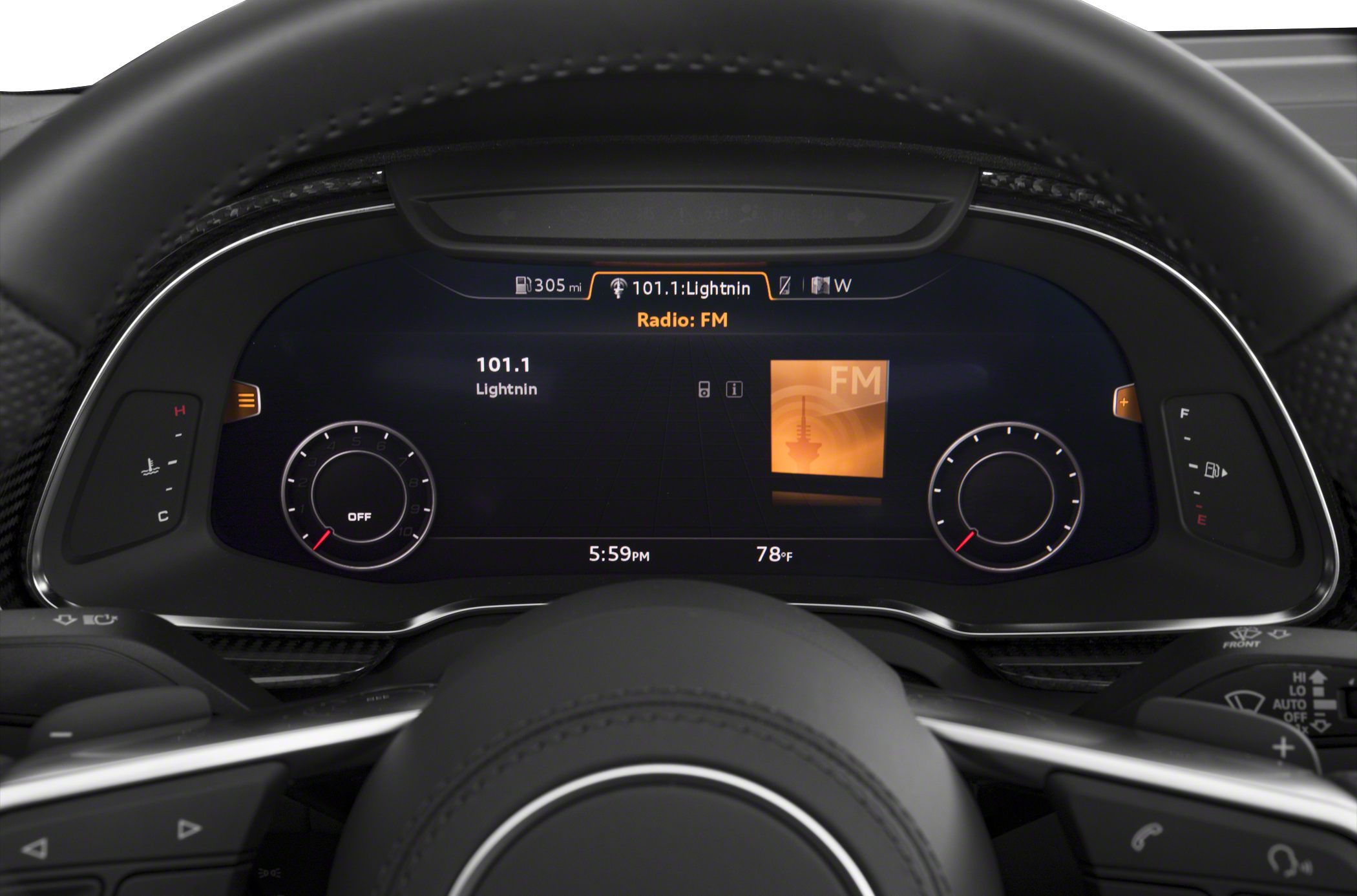Digital instrument cluster with radio and gauges.