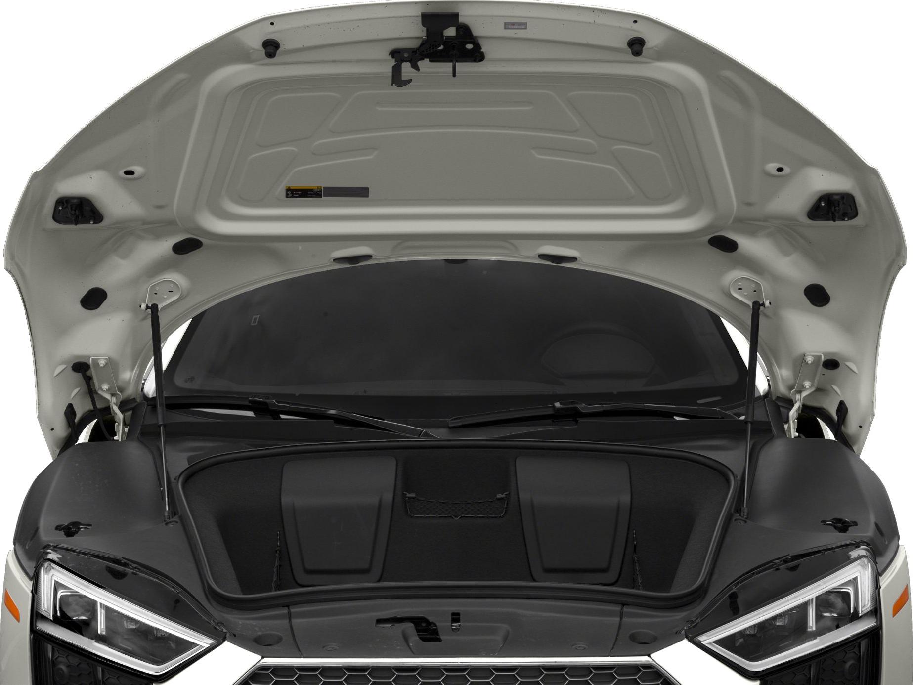 Front trunk compartment with open hood and storage space.