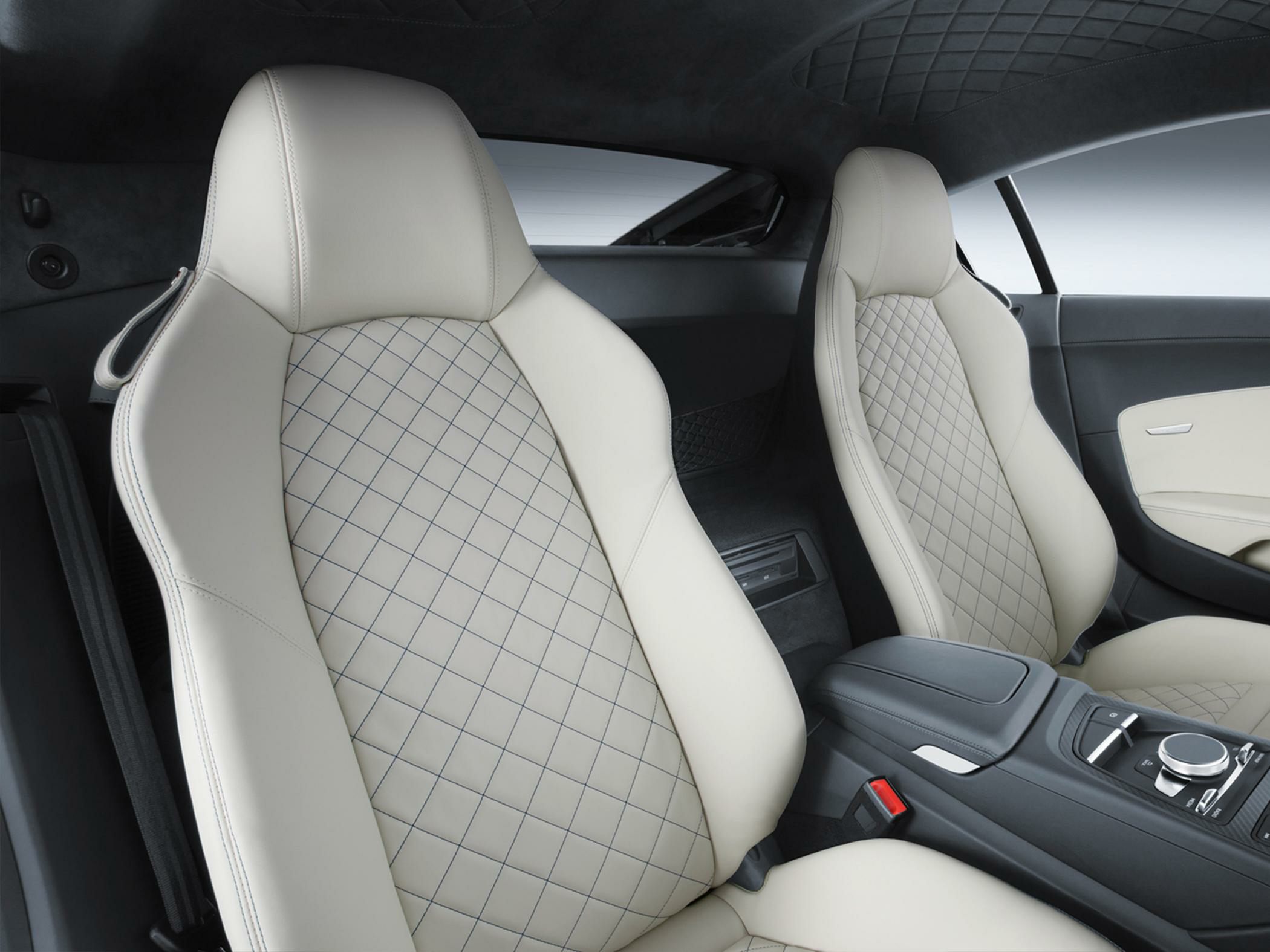 Quilted leather sports seats and modern center console interior