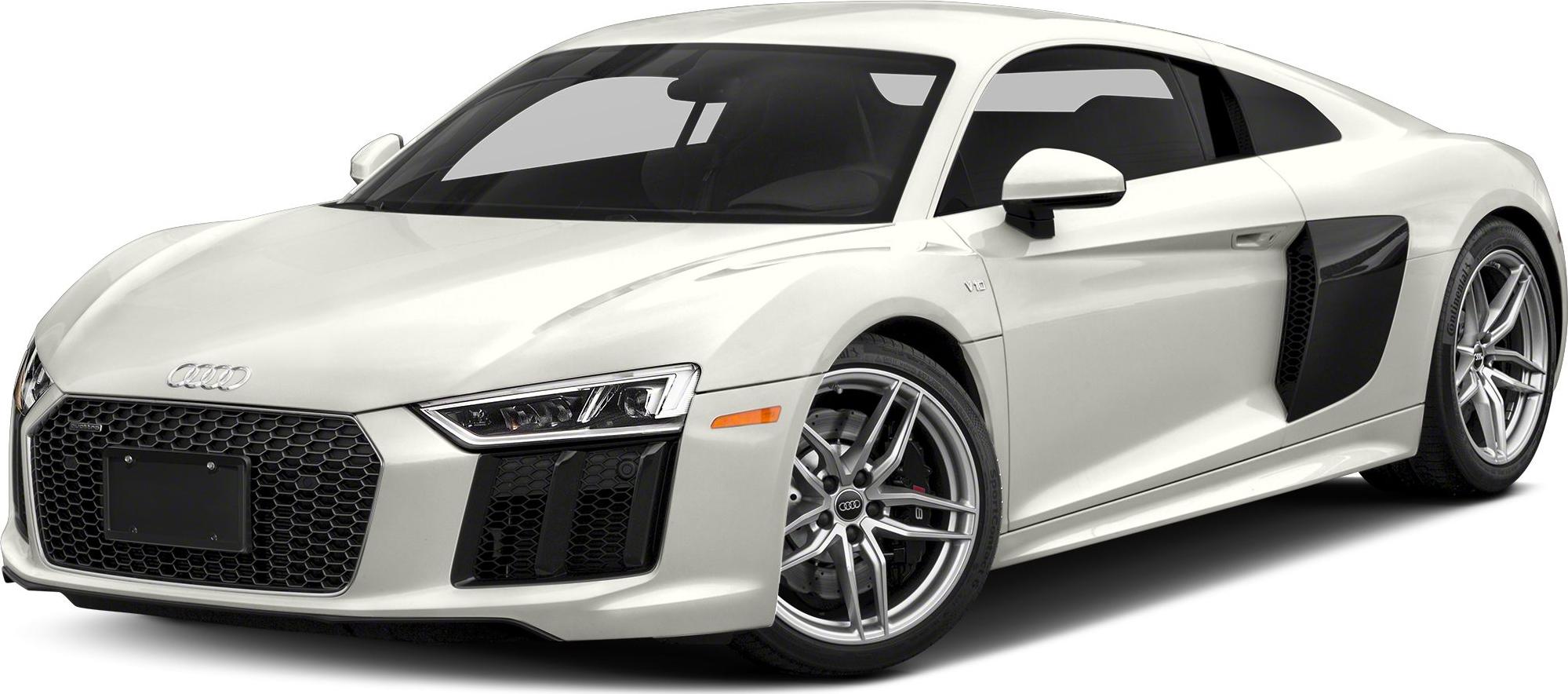 Front view of a sporty coupe with hexagonal grille and LED headlights