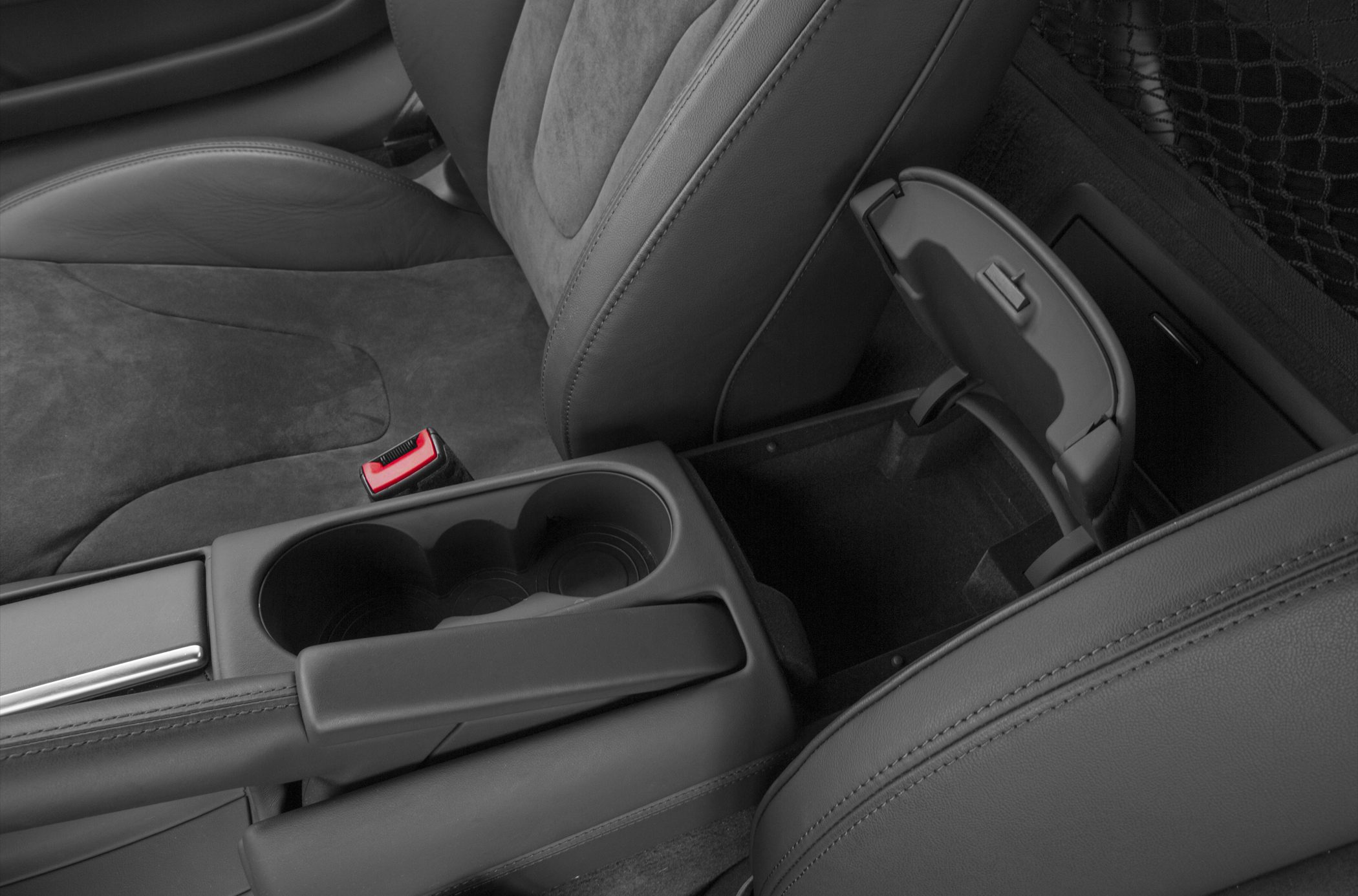 Center console with cup holders and sports seat upholstery