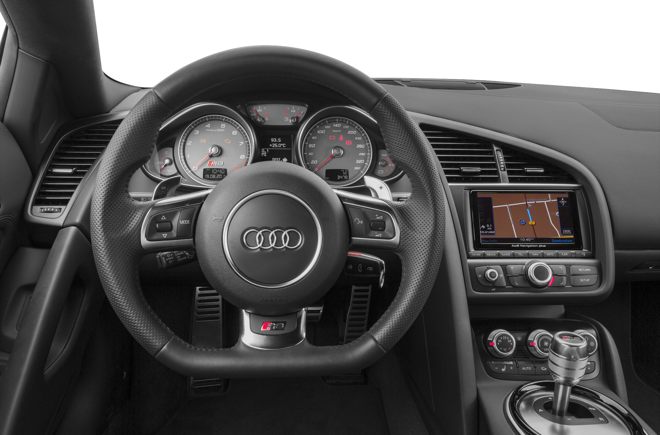 Steering wheel, instrument cluster, and navigation display in sporty car interior