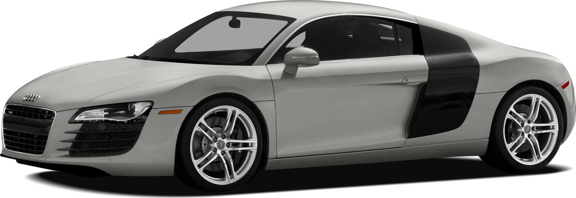 Front side view of a coupe with prominent side blade and alloy wheels