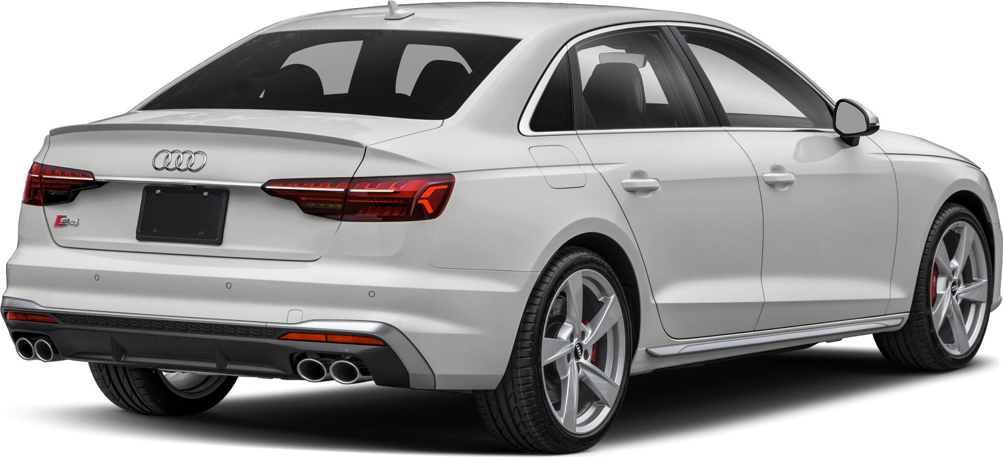 Rear view of a sedan with quad exhausts and LED taillights
