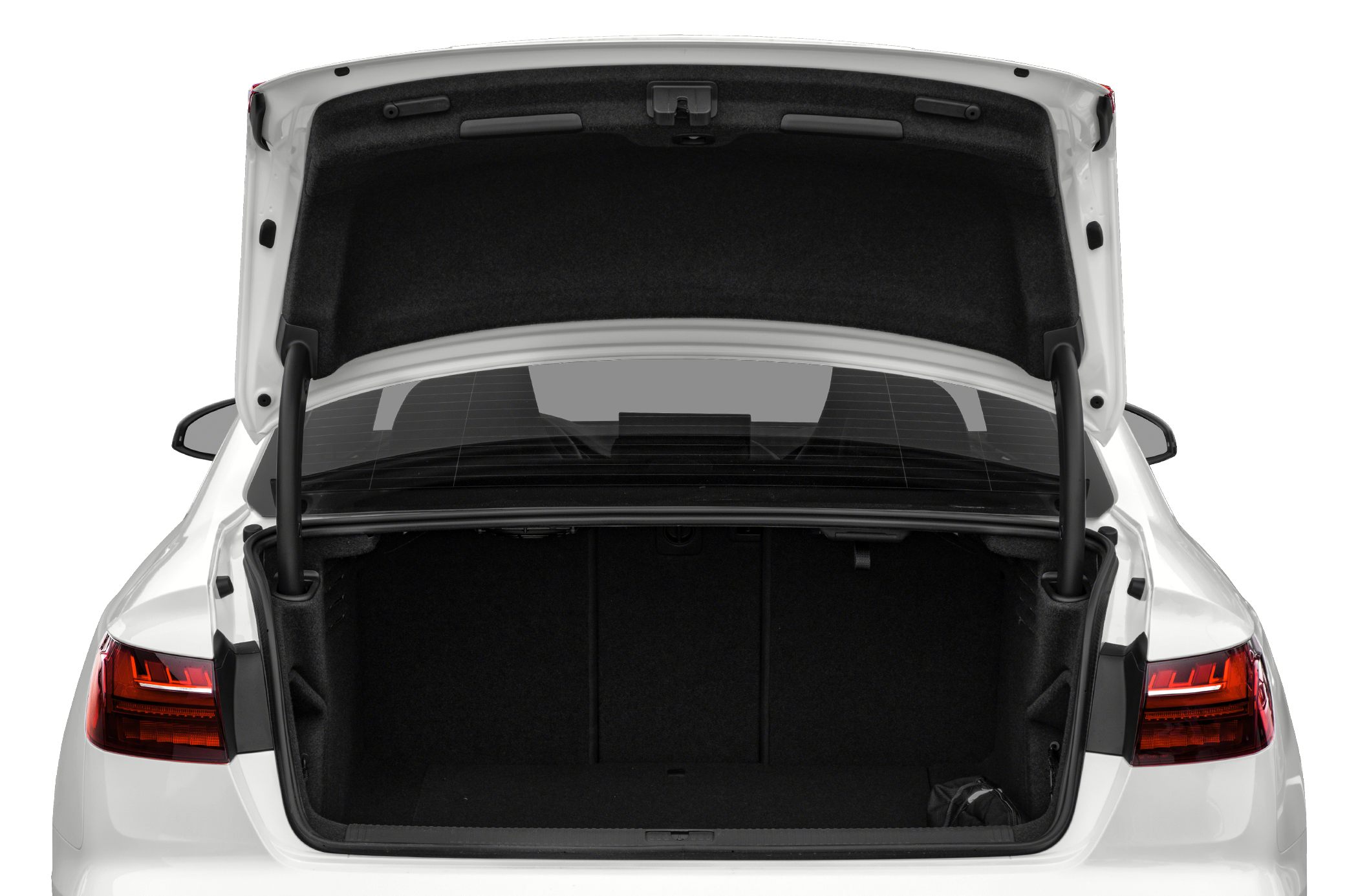 Open rear trunk with spacious black cargo area and trunk lid.