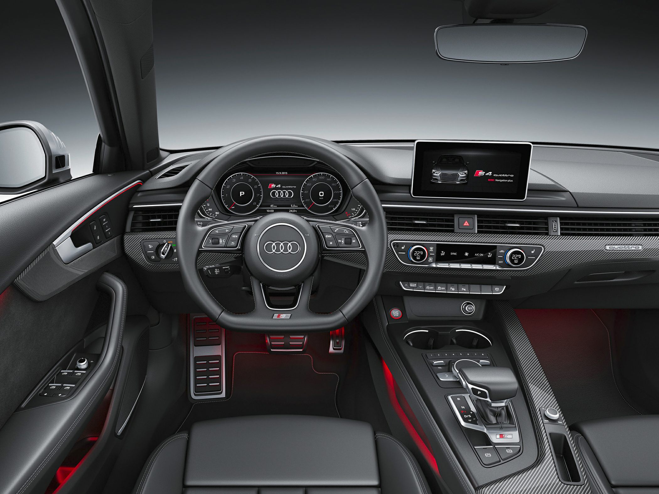 Digital cockpit, multifunction steering wheel, center console with multimedia display.