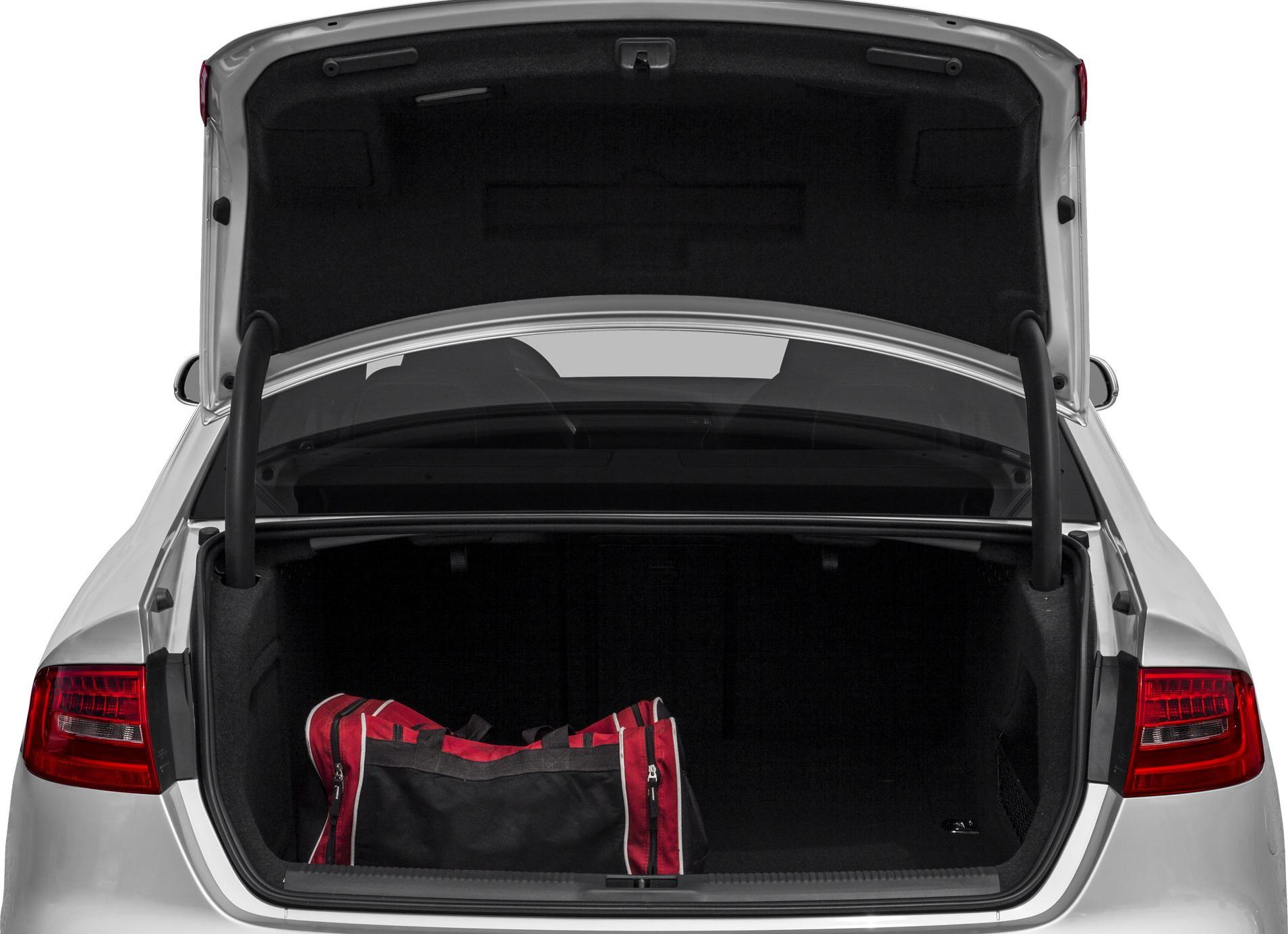 Open car trunk with a red and black duffel bag