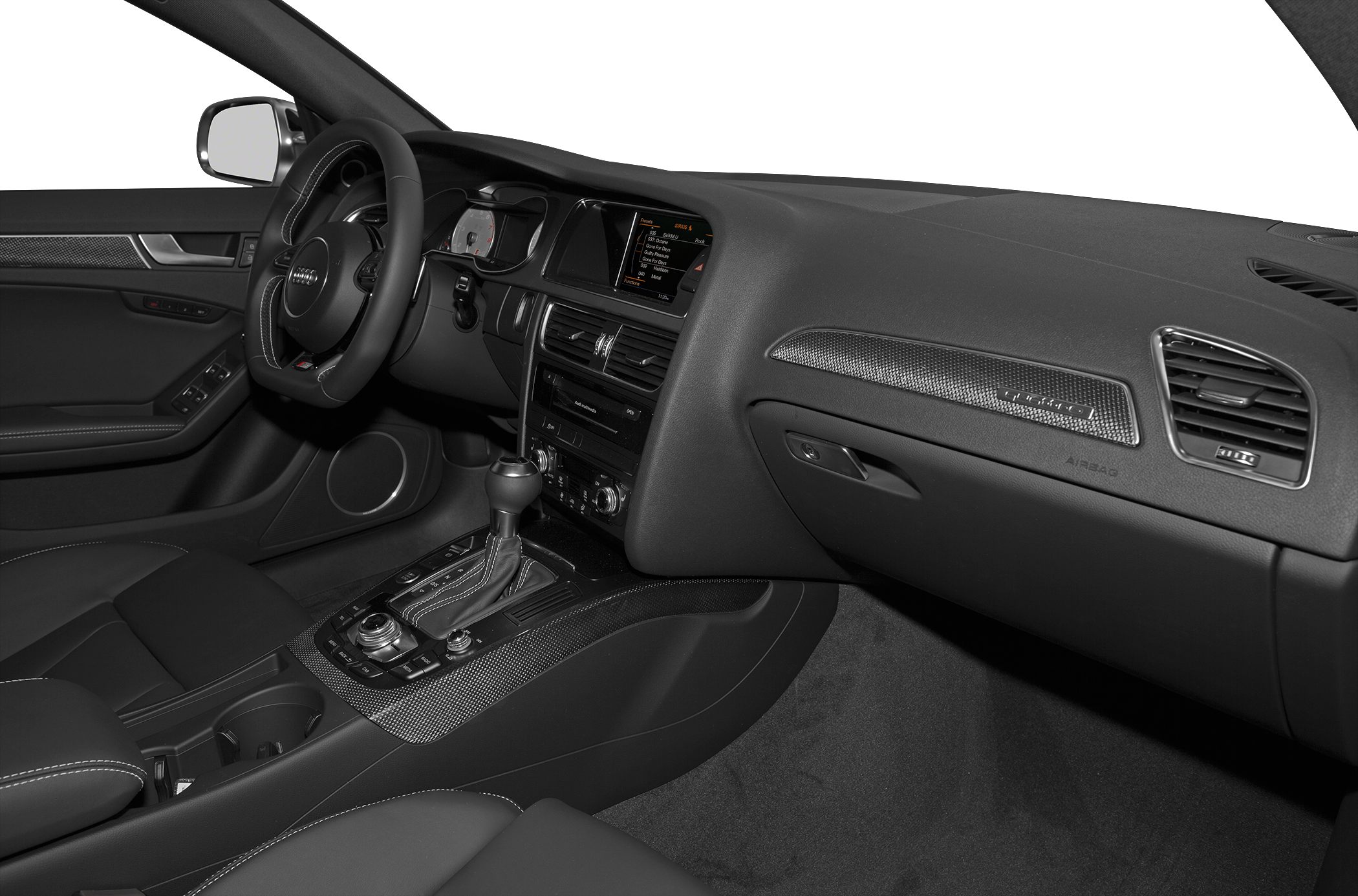 Interior view showing dashboard, steering wheel, and center console with automatic gear lever.