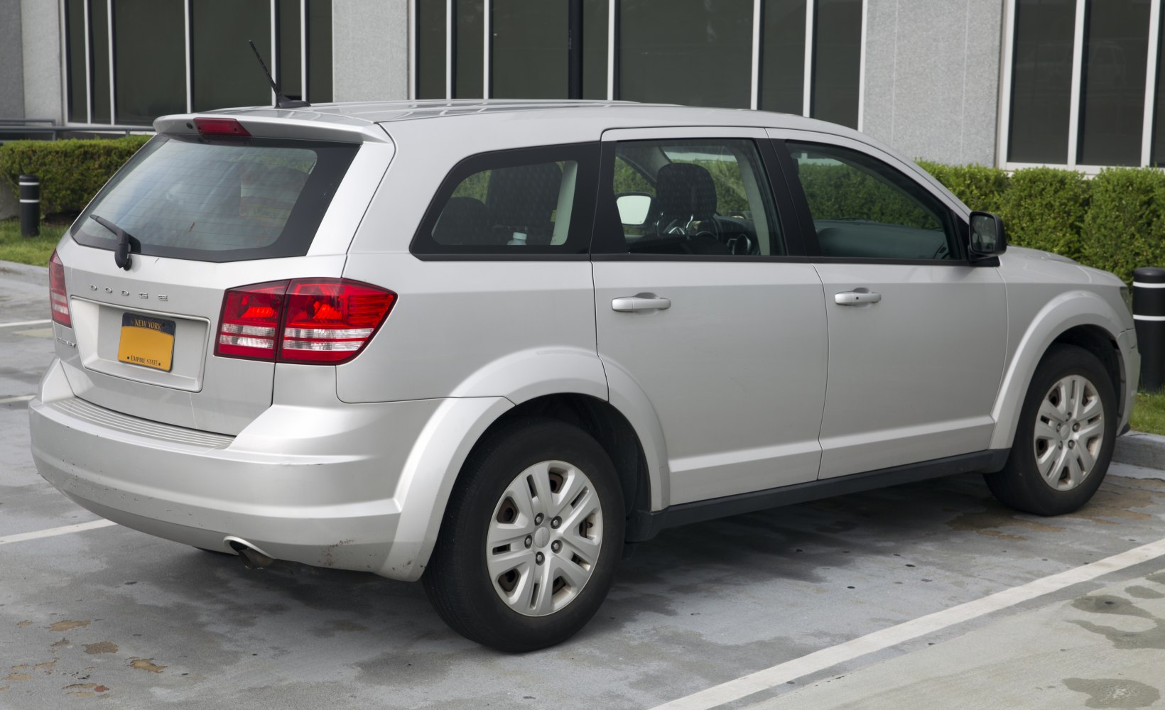 Rear and side view of a mid-size SUV with distinct SUV styling.