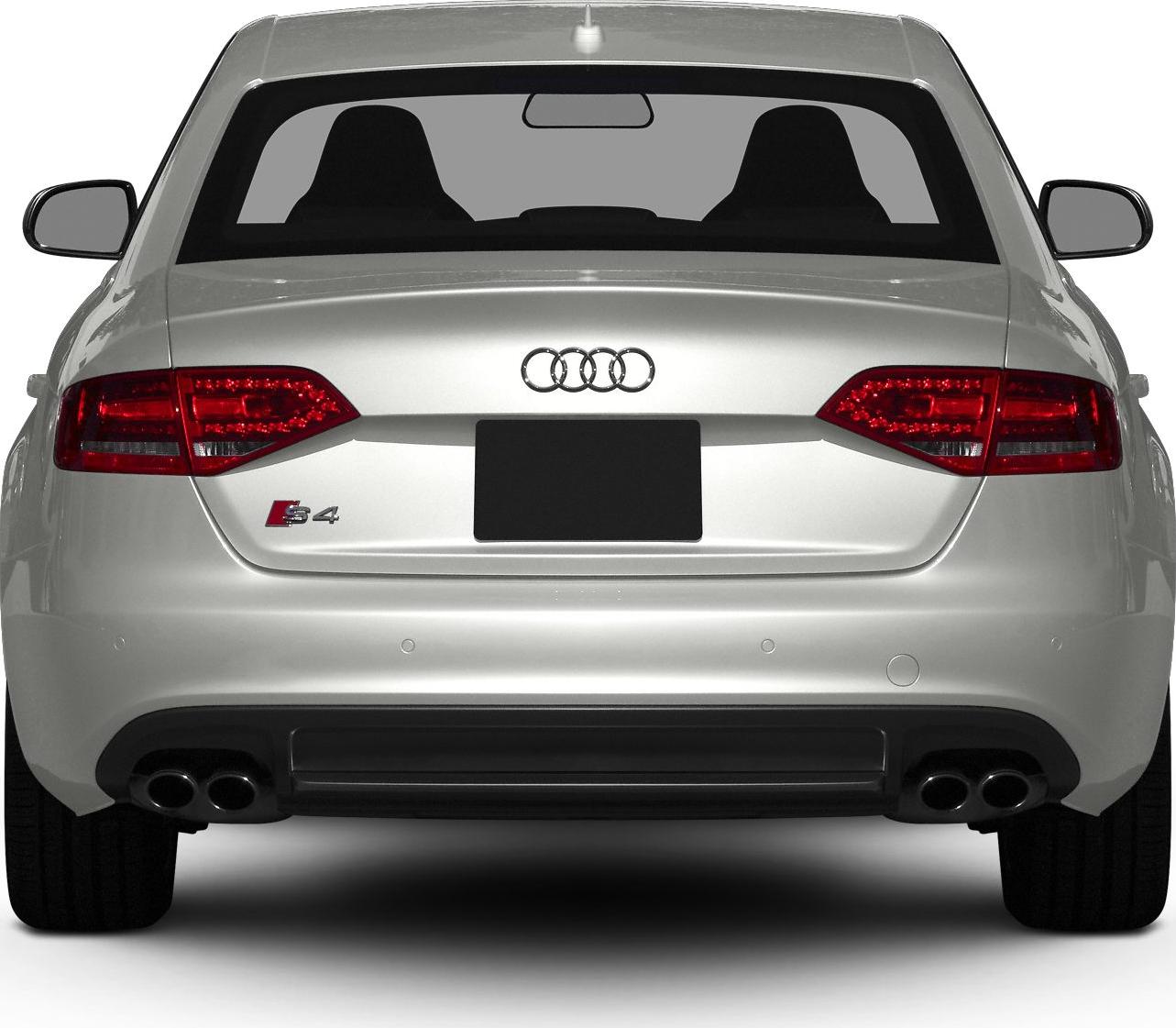 Rear view with distinct taillights and quad exhausts