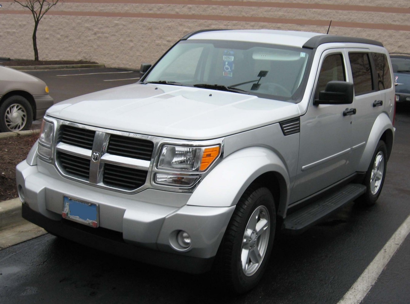 Front side of SUV with bold grille and headlights