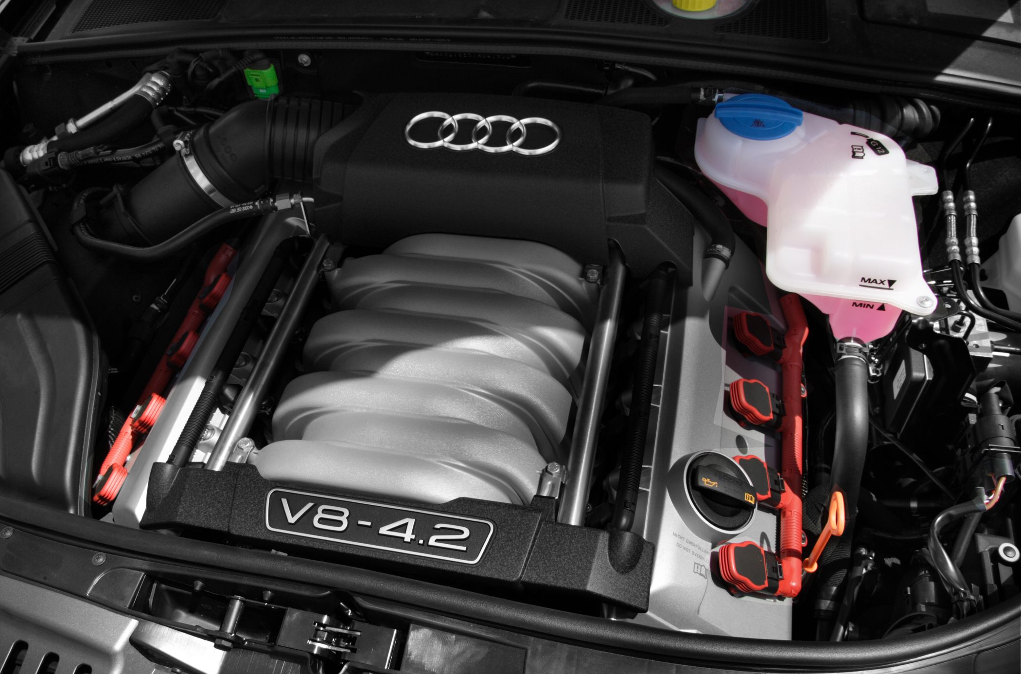 4.2L V8 engine bay with Audi logo and visible components